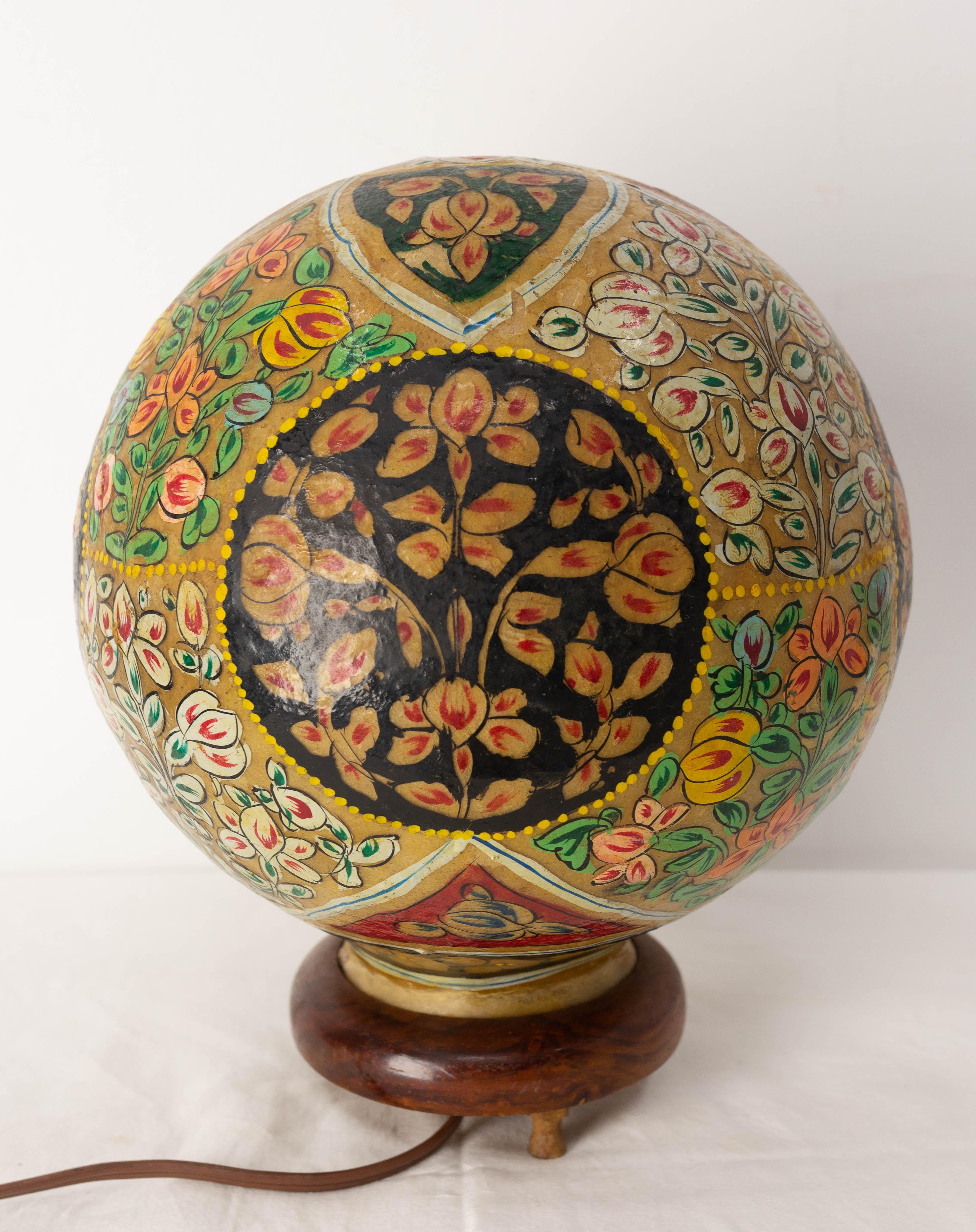 Table lamp made in Morocco with camel leather (vellum) and wood.
The flower pattern decoration typical of the oriantal style was made by hand.
circa 1900.
Good antique condition.
This can be re-wired and tested to USA or European and UK