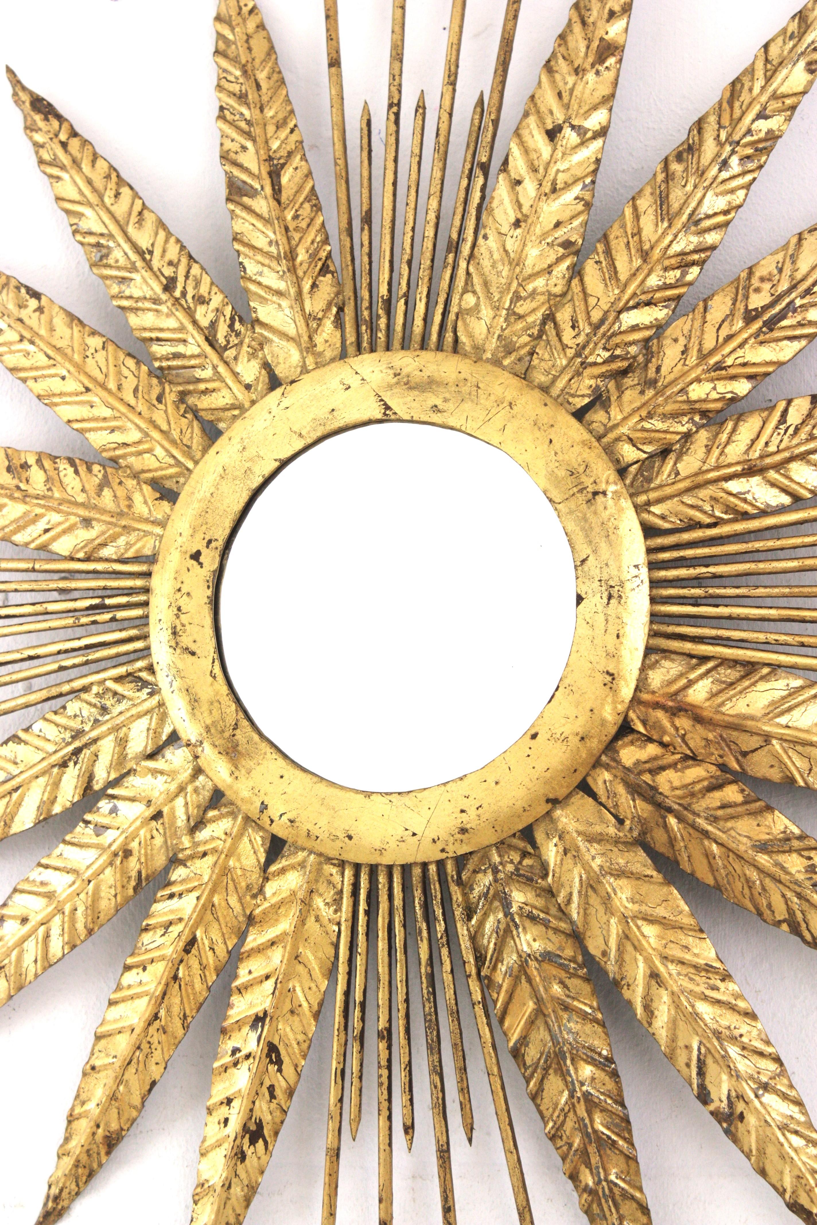 French Sunburst Mirror in Gilt Iron with Spikey Leafed Frame, 1940s For Sale 3