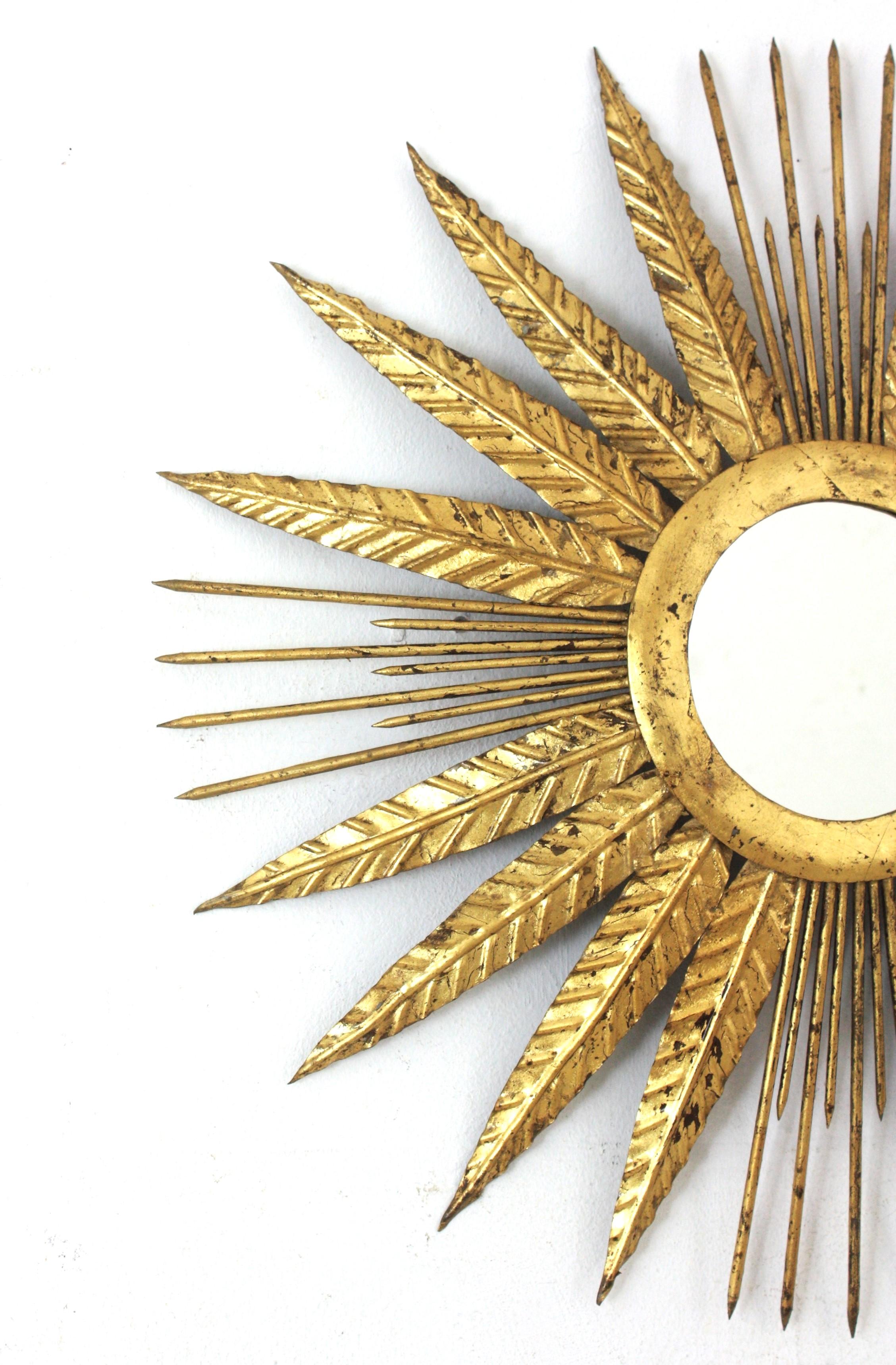 20th Century French Sunburst Mirror in Gilt Iron with Spikey Leafed Frame, 1940s For Sale