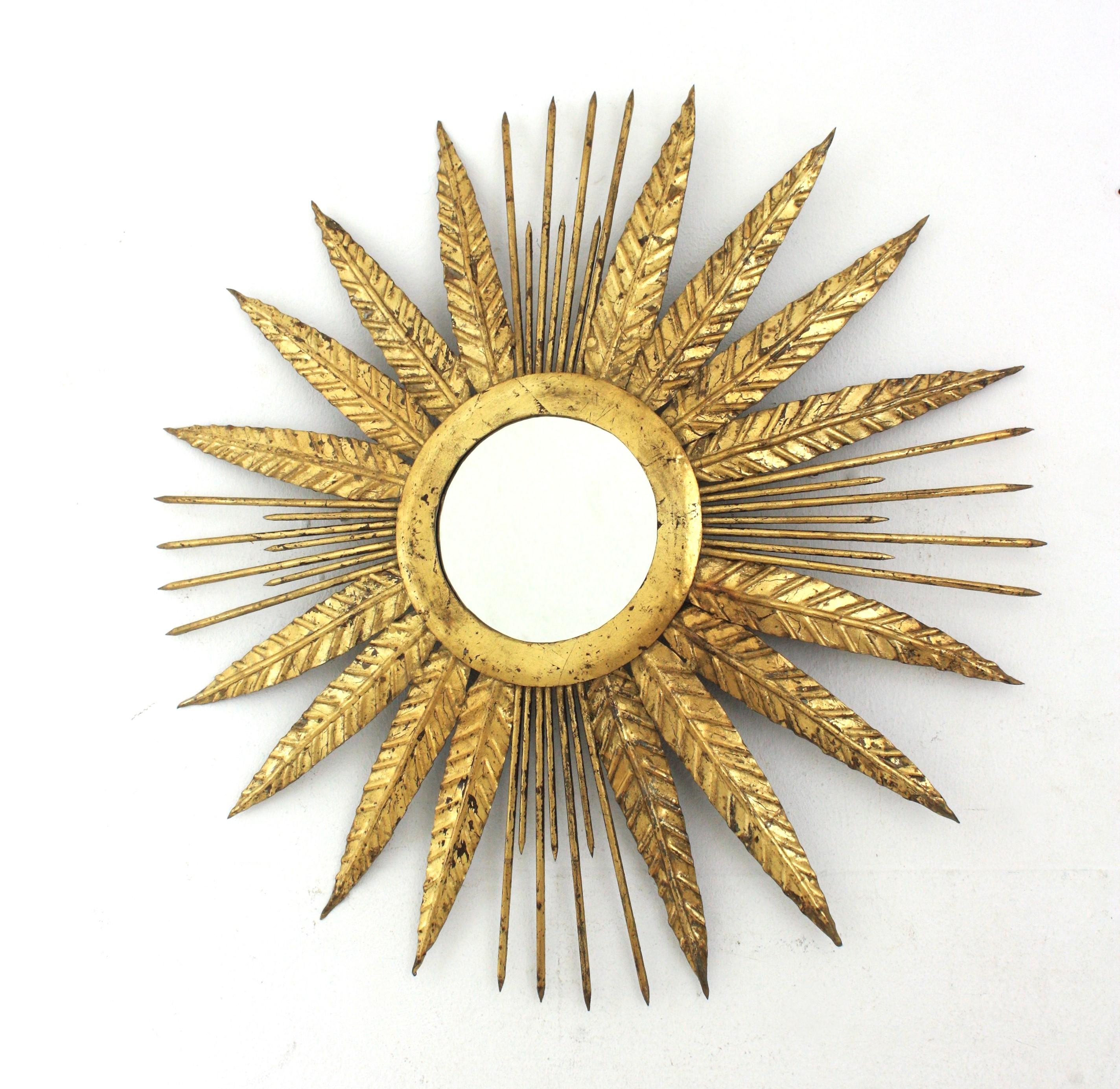 French Sunburst Mirror in Gilt Iron with Spikey Leafed Frame, 1940s For Sale 2