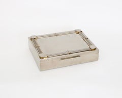 Humidor francese diviso in acciaio inossidabile e ottone della gioielleria francese Fred