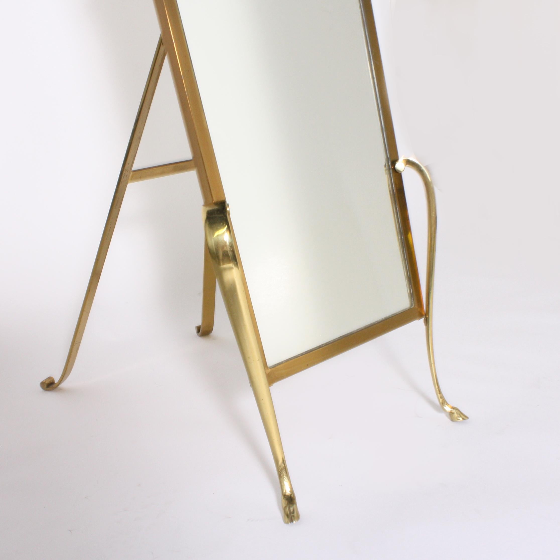 French standing vanity mirror with brass stand, circa 1950.