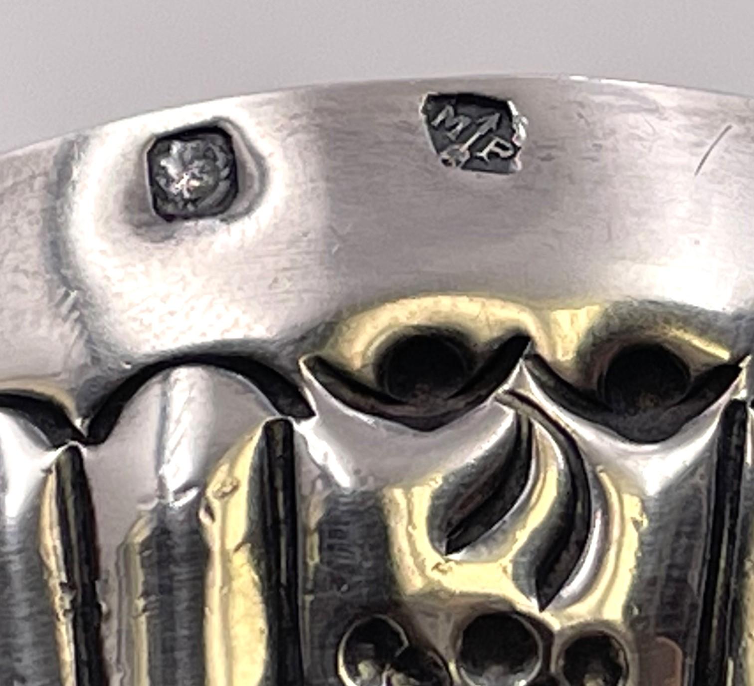 19th century French 0.950 (higher purity than sterling) tastevin (or wine taster). The inscription A Bon Vin Bonne Humeur translates as To Good Wine, Good Humor. The handle is beautifully engraved and there are raised grape motifs in the body. It