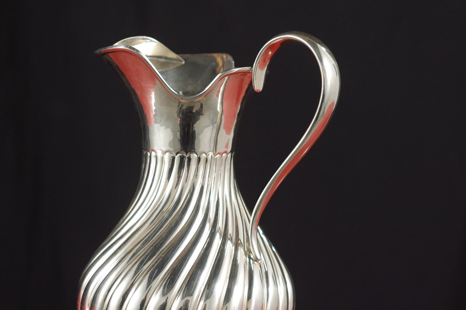 Hand-Crafted Sterling Silver Water Pitcher: Timeless Elegance Restored For Sale