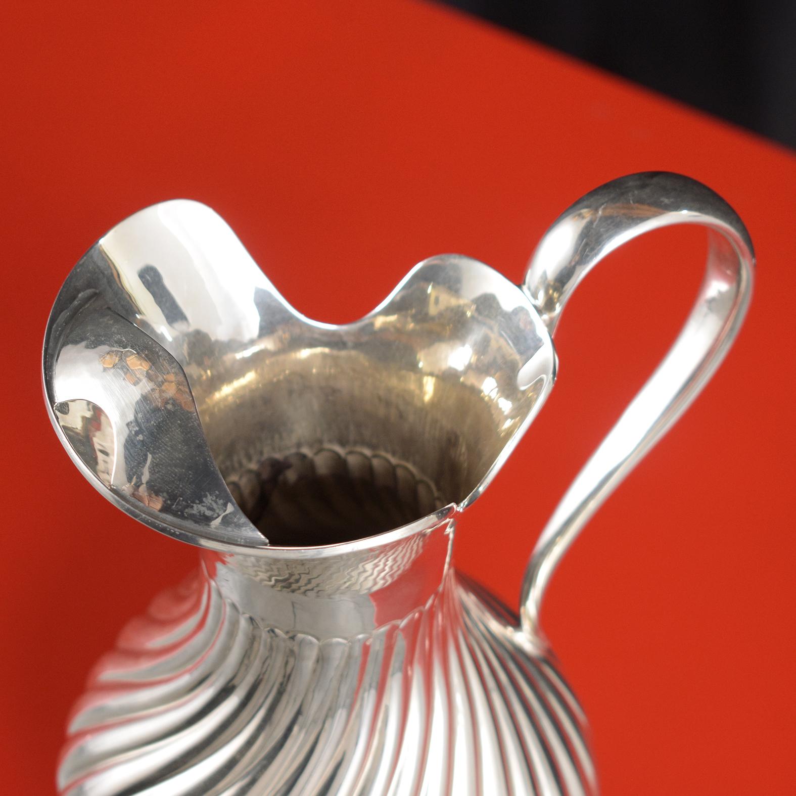 Sterling Silver Water Pitcher: Timeless Elegance Restored In Good Condition For Sale In Los Angeles, CA
