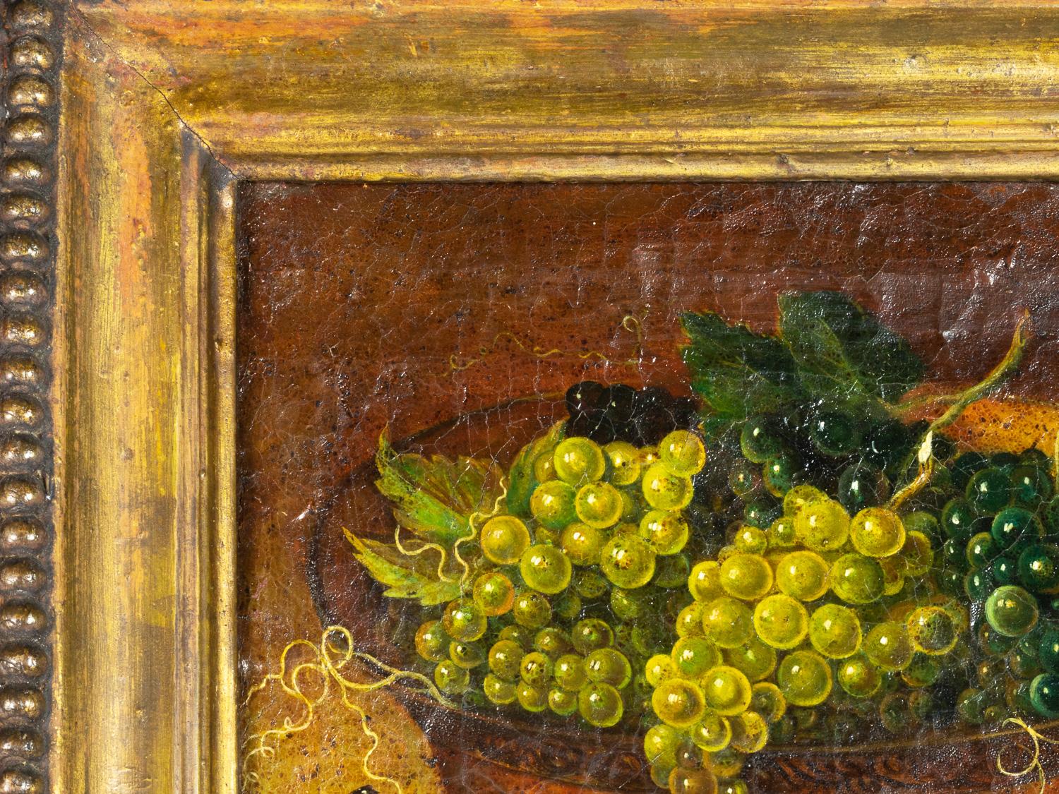 In this 19th-century still life painting, a wide bowl brimming with grapes takes center stage. The artist drew inspiration from the picturesque Provençal style, resulting in a captivating scene.

Frame 52 x 45 cm
Canvas 40 x 31 cm