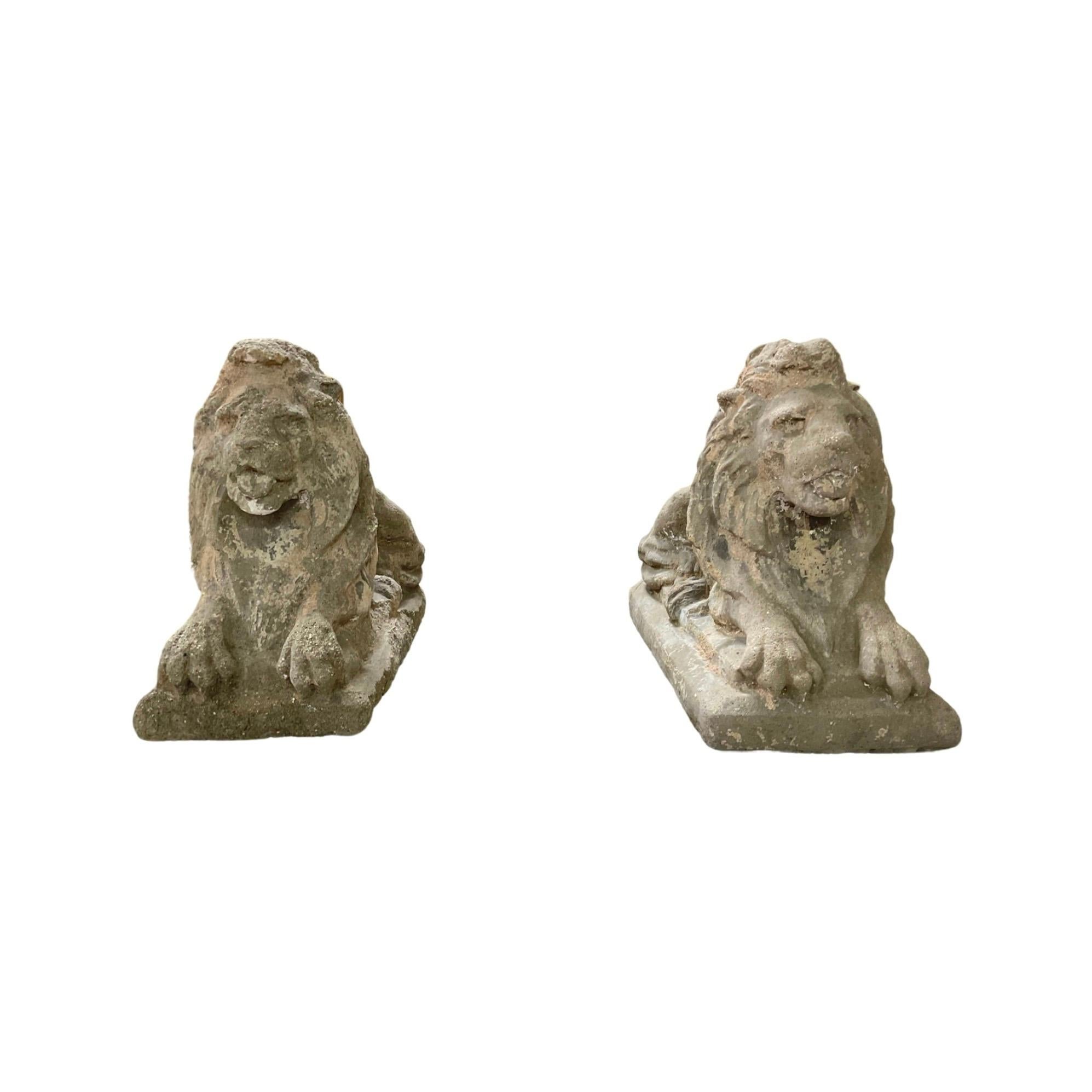 These French Stone Composite Lion Sculptures from the 1910s are a unique and stunning addition to any home or garden. Crafted from a combination of stone and composite materials, these sculptures will stand the test of time. Available as a pair,