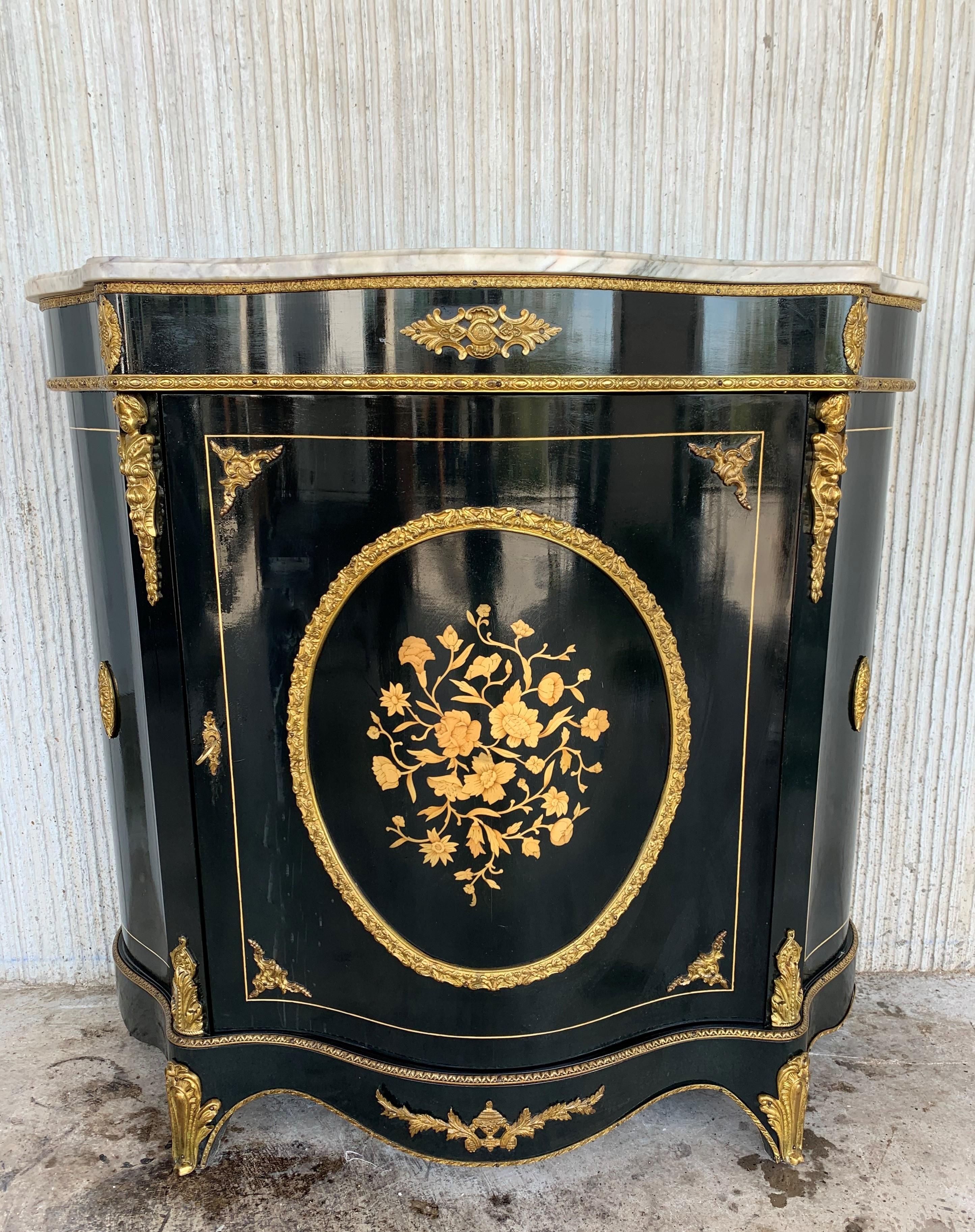 Impressive 20th century French Napoleon III stone overlay ormolu mounted ebonized cabinet with grey vetted marble top.

The shaped grey marble top is over a frieze with gilt bronze mounted in an leaf-tip motif with an egg and dart border, above a