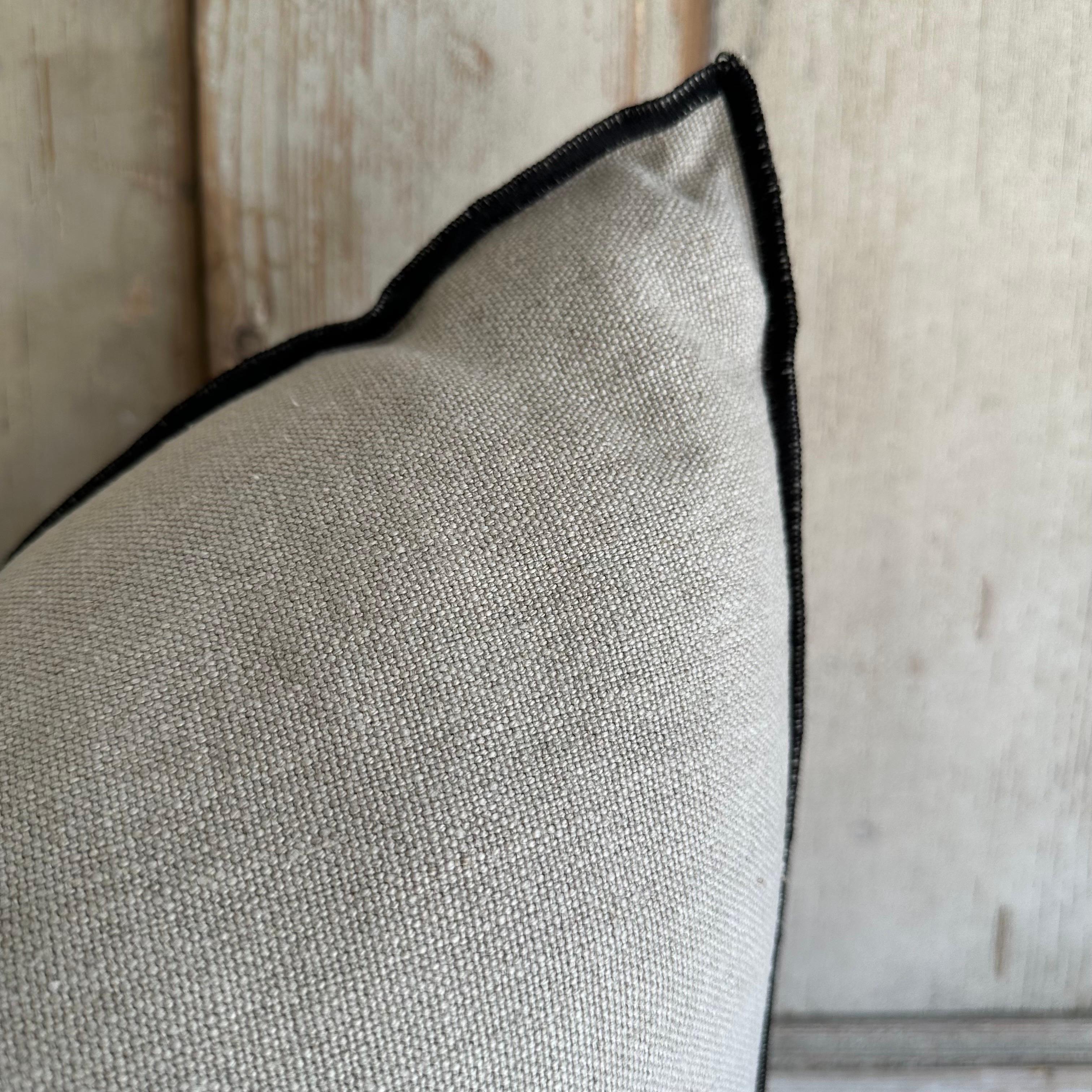 French stone washed linen accent pillow with down feather insert.

Color: natural linen; textured style pillow with a stitched edge, metal zipper closure. 
Size: 22
