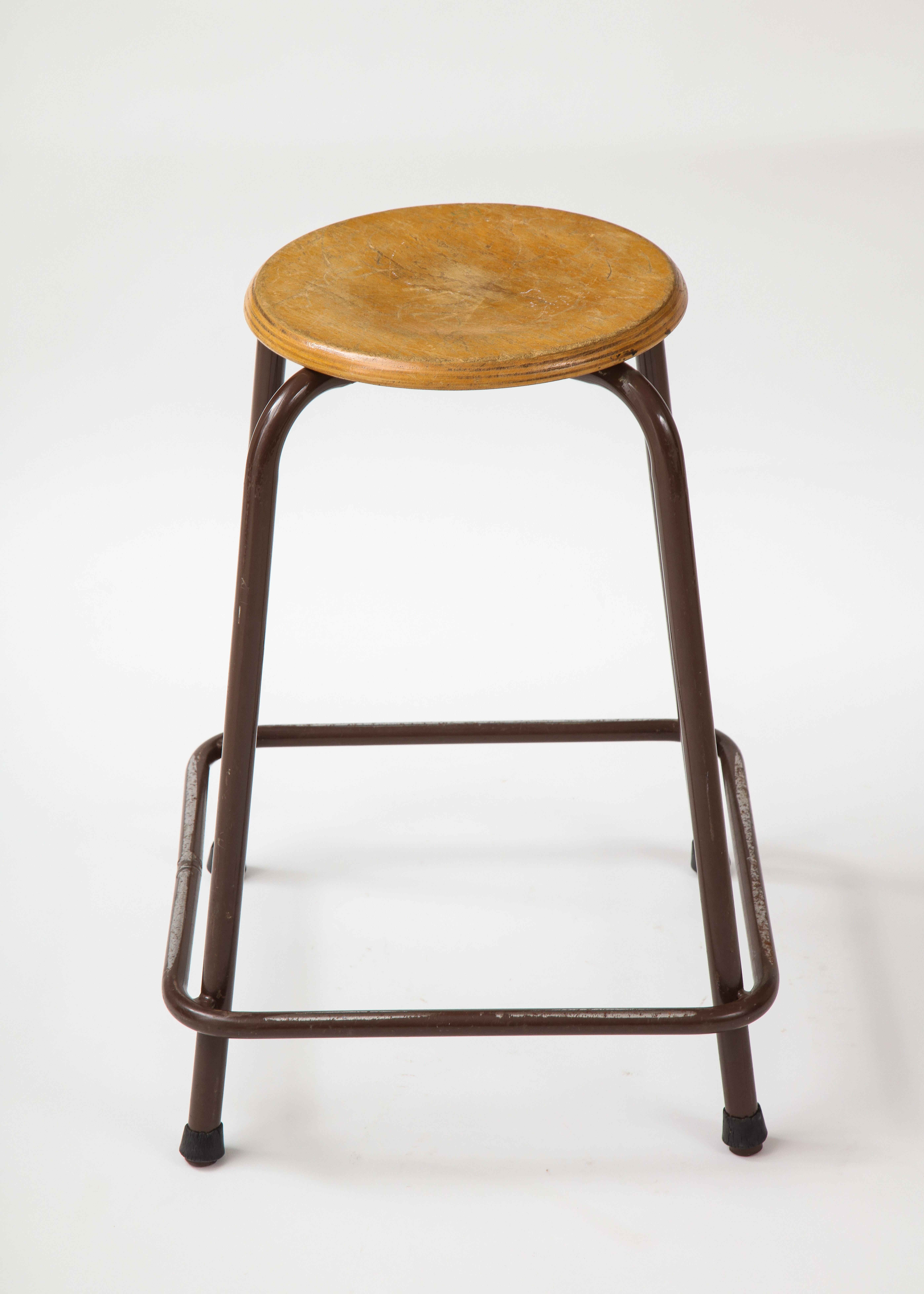 French stool with a wood seat & metal base, c. 1950.