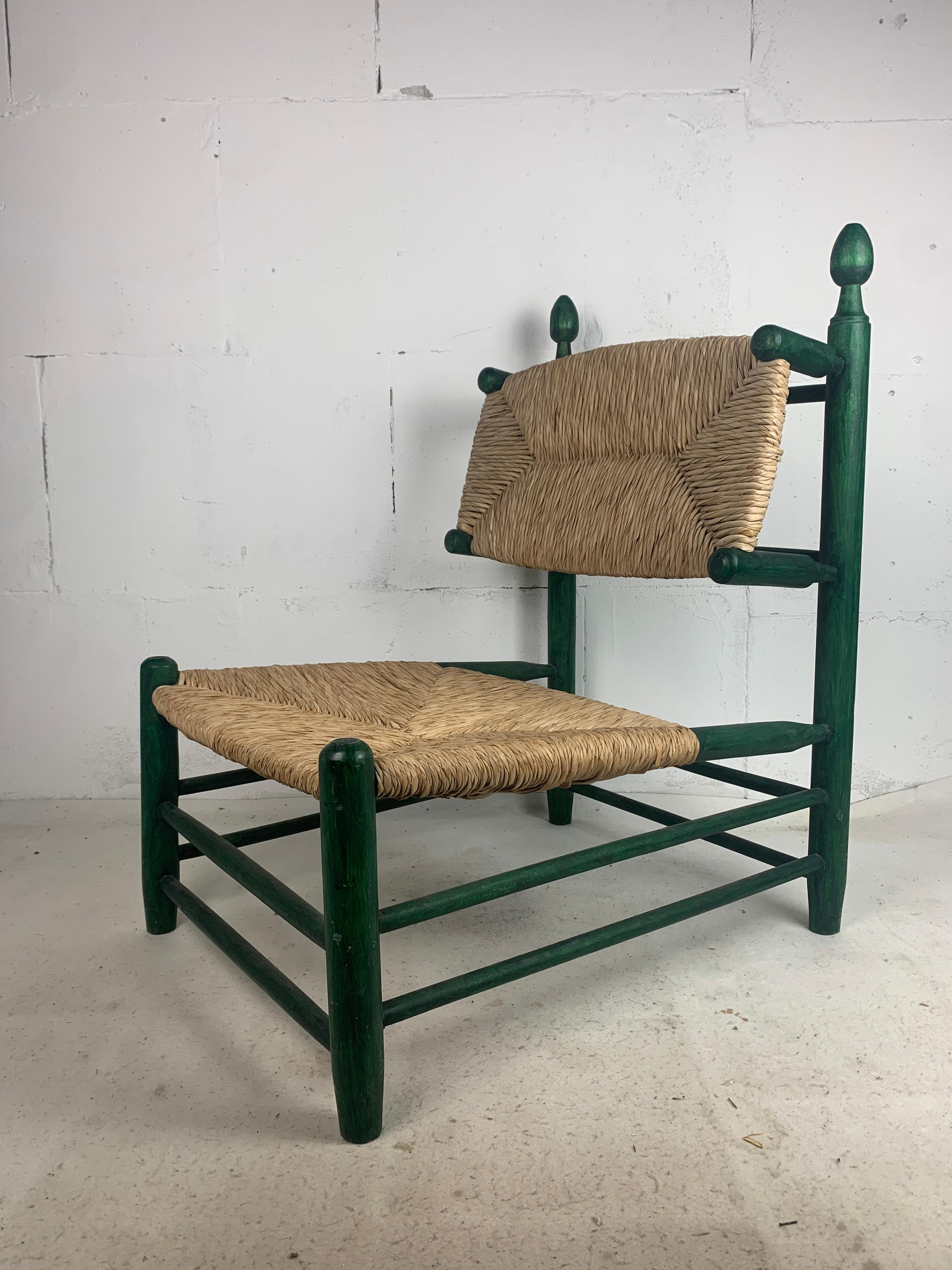 Wonderful green oak rush chair often named in the style of Charles Dudouyt and Charlotte Perriand. This chair dates from the 50s and is in great vintage condition. All the rush straw is still intact and the paint has light wear and an honest touch
