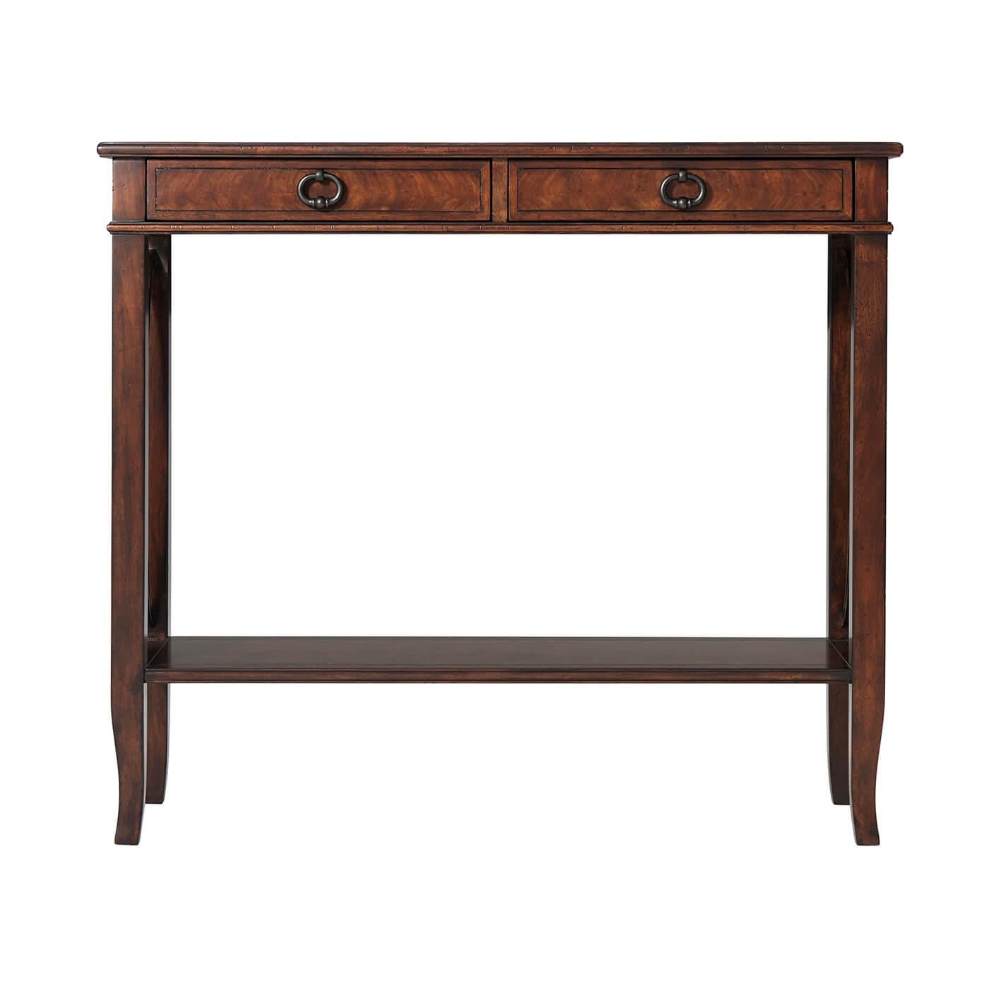 A French neoclassic mahogany console table, the rectangular crossbanded and molded edge top above two frieze drawers, on square legs joined to the sides by wavy x stretchers and on splayed legs, joined by a crossbanded under tier. 

Dimensions: