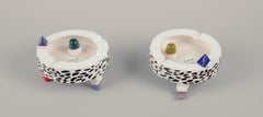 French studio ceramicist. Two ashtrays in faience. Abstract futuristic style.