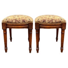 French Style Carved Fruitwood Ottomans in Needlepoint Leopard, Pair
