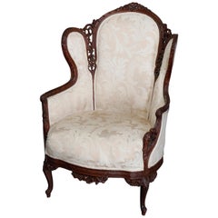 French Style Carved Mahogany Upholstered Wingback Fireside Chair, 20th Century