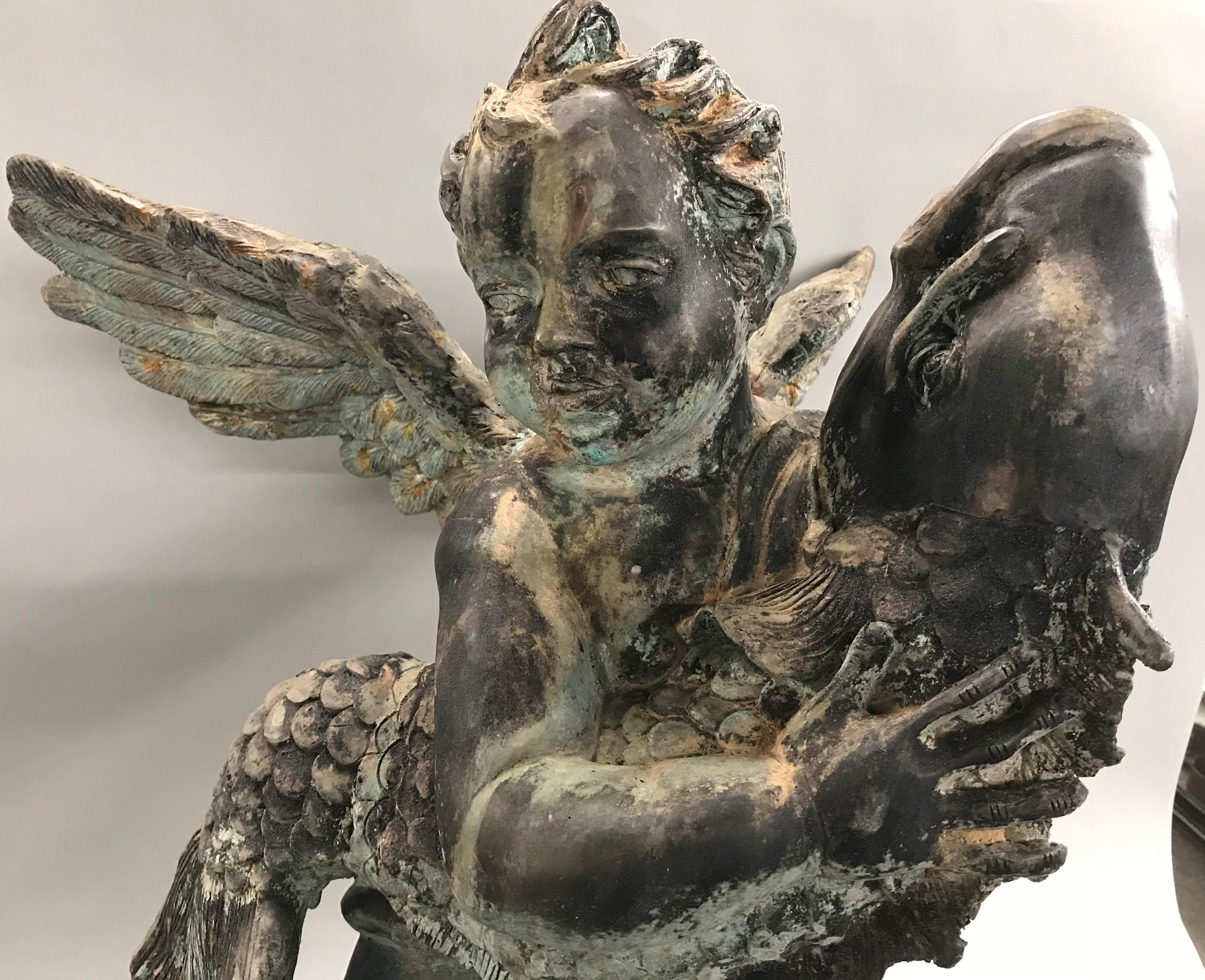 French Style Cast Iron Fountain with Winged Cherub or Putti Holding a Fish 1
