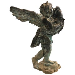 Vintage French Style Cast Iron Fountain with Winged Cherub or Putti Holding a Fish