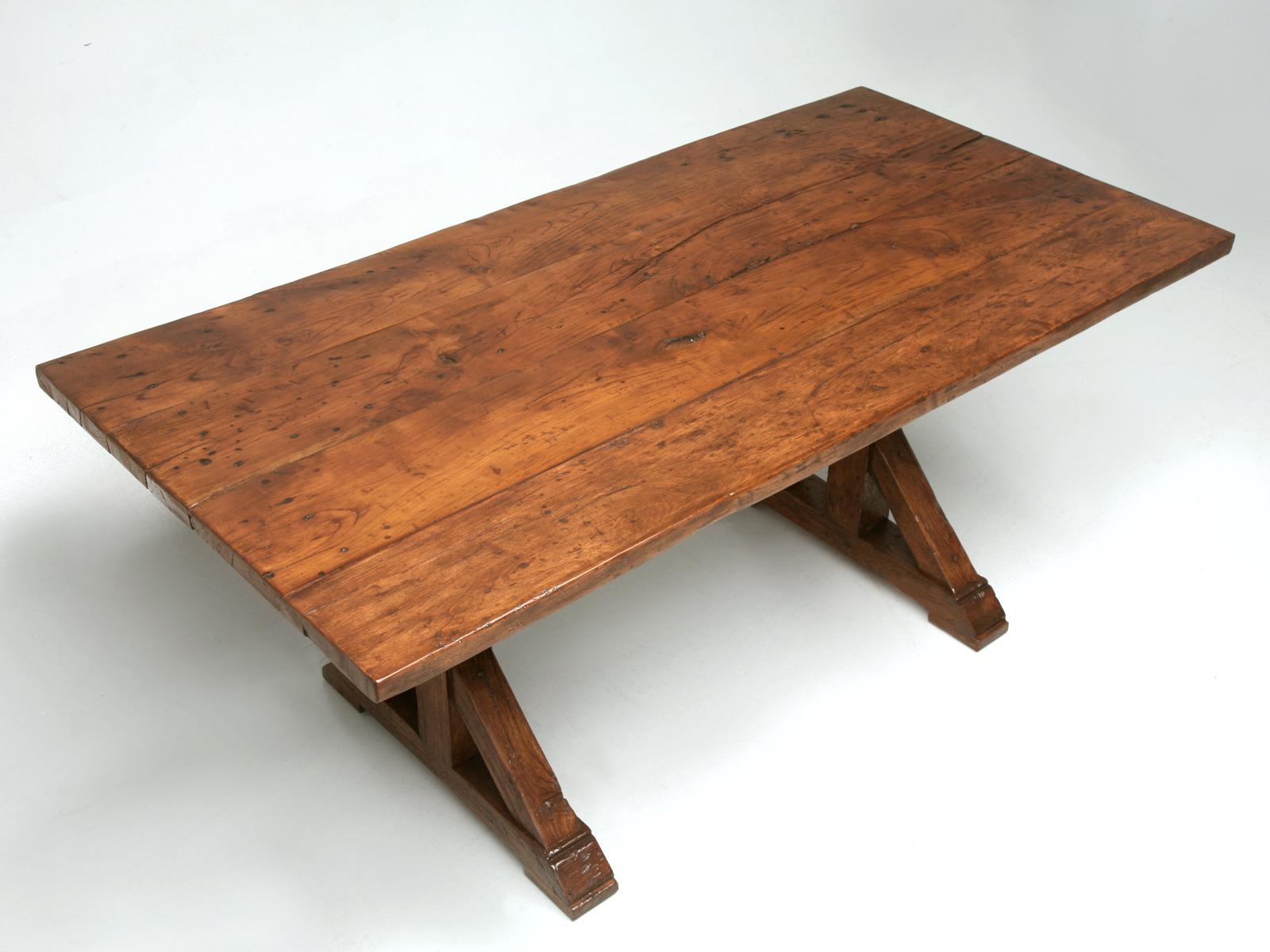 This exceptional French style farm, kitchen or dining room table was precisely copied from an authentic French farm table that dated from the late 1600's or early 1700s. Our Old Plank workshop used only reclaimed lumber, some of which was sourced in