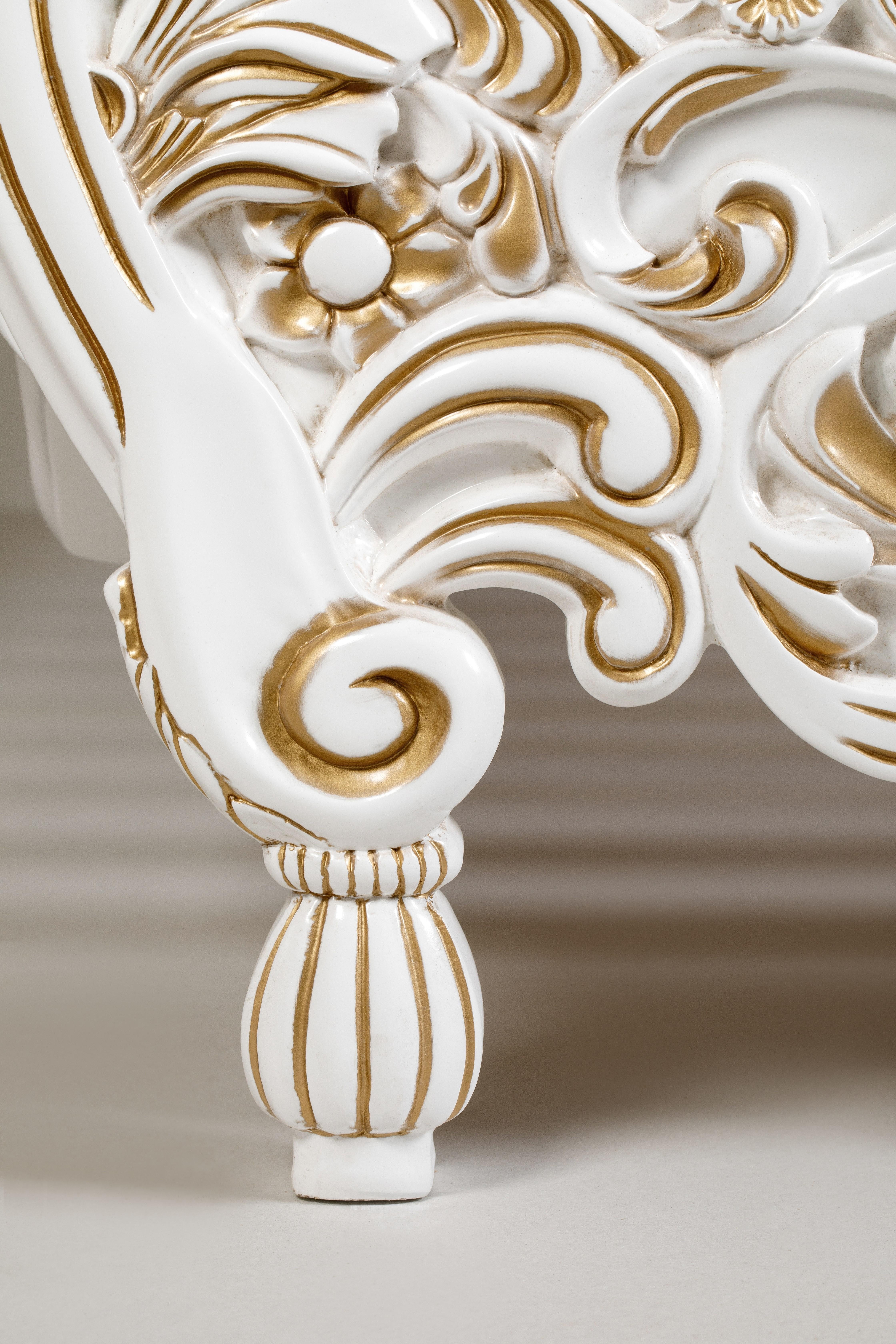 You deserve to sleep like royalty in our breathtaking Royal Gold White Bed. This 100% hand-carved bed frame is finished and gilded in gold accents. The enchanting details of this piece is reminiscent of your favorite fairy tale story. This versatile