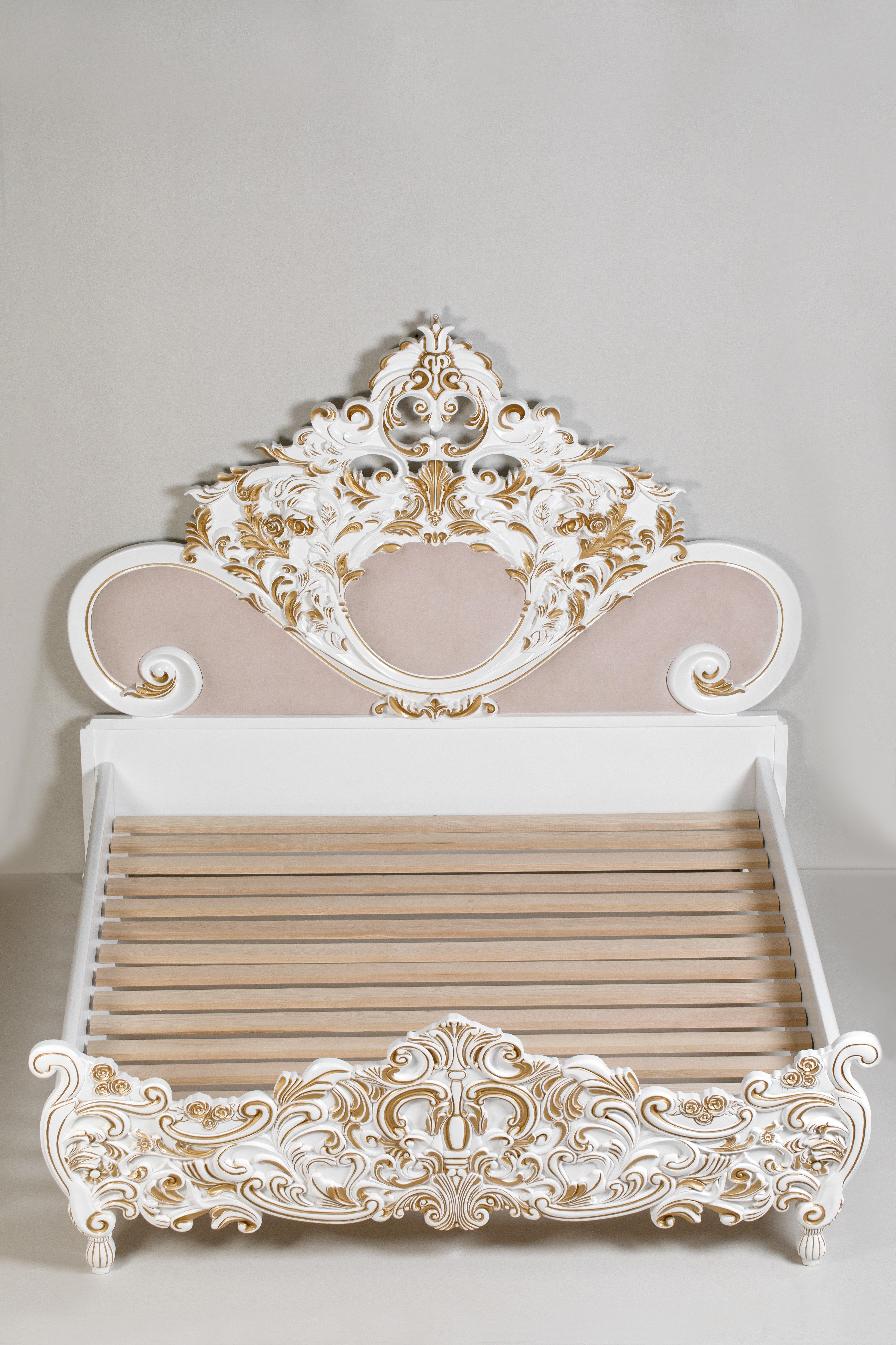 white and gold bed