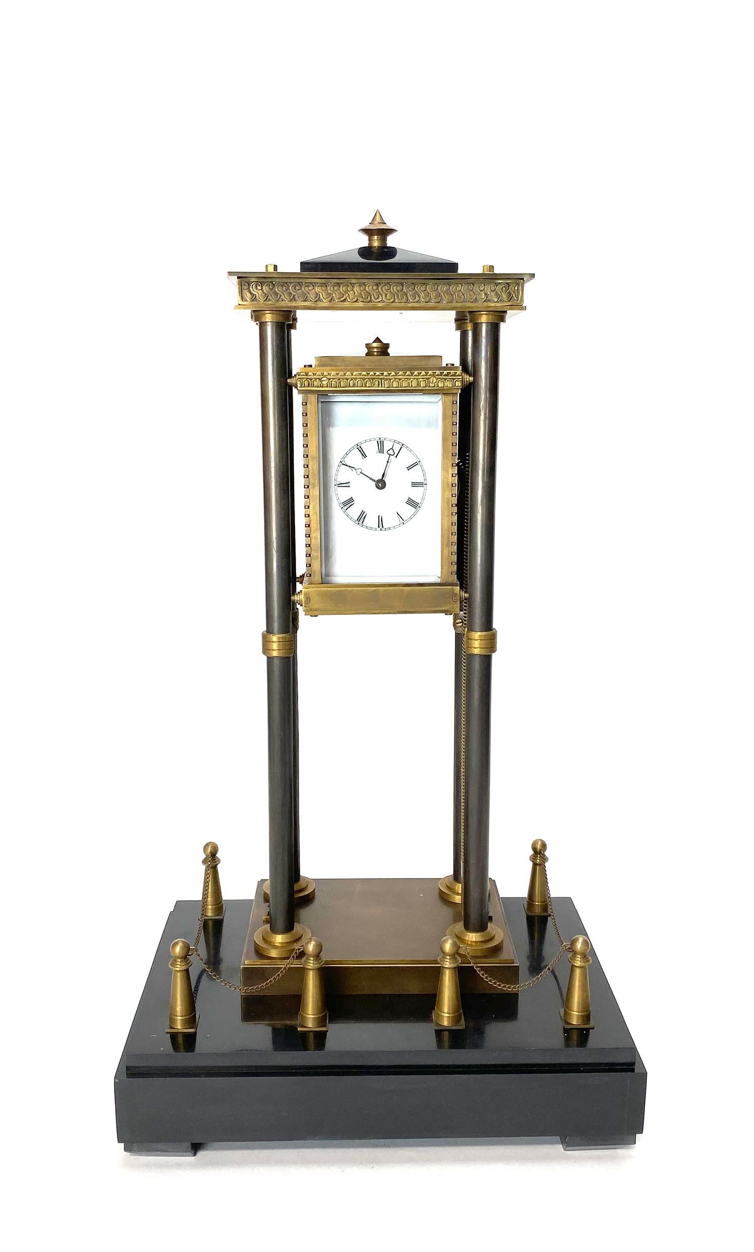 French Style Gravity Driven Industrial Elevator Industrial Clock w Marble Base

Here we have a wonderful example of the industrial series popular in French horology. This clock is driven by its own weight as it slows falls downwards on the 4 posts.
