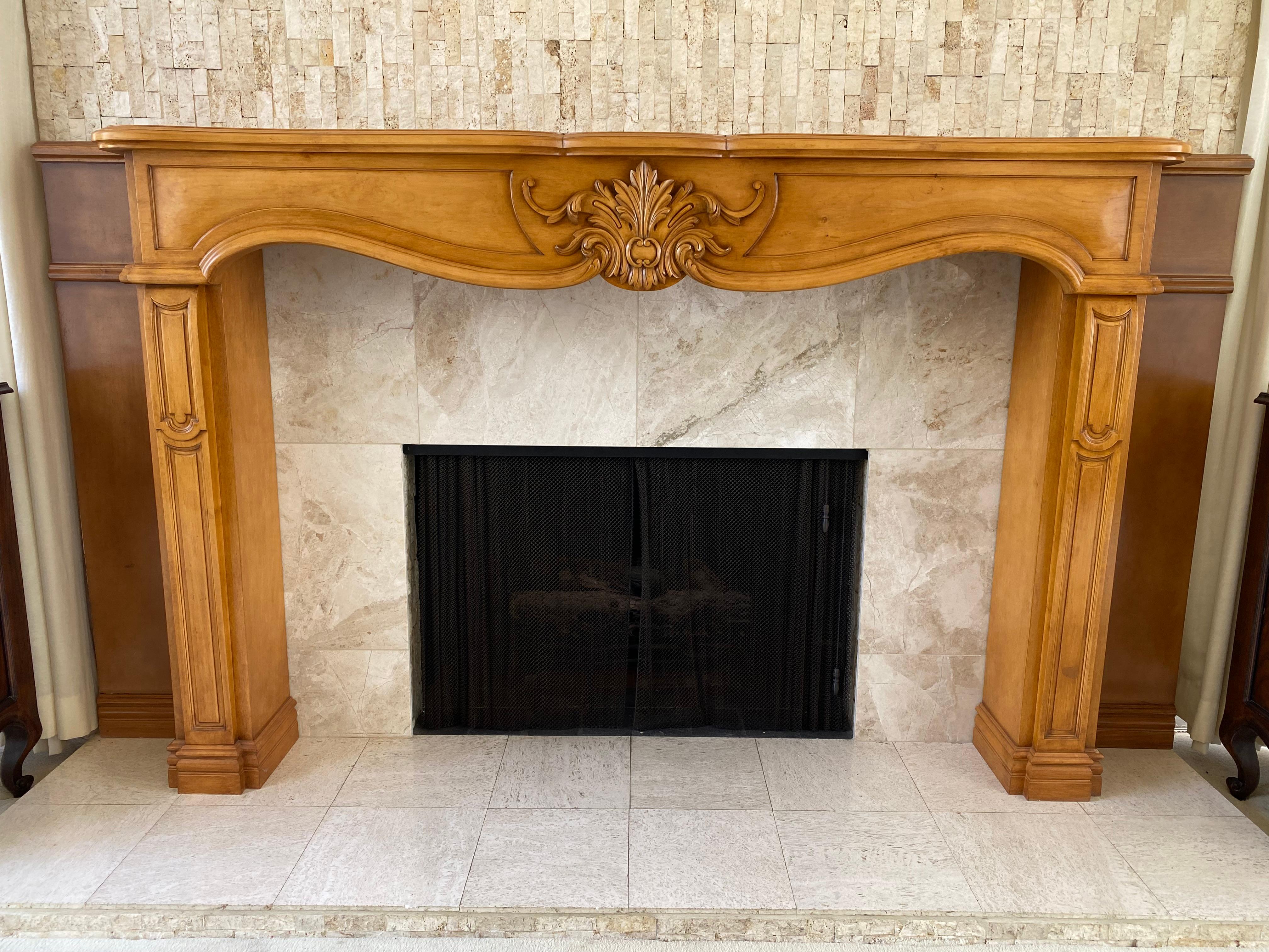 French Provincial style hand carved fireplace mantle in alder wood. Measures: Total width is 93
