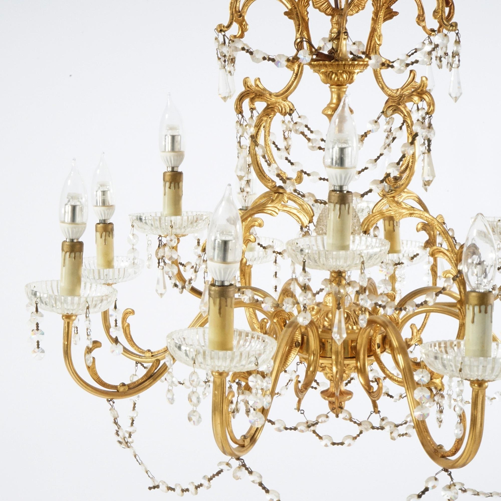 American French Style Gilt & Crystal Twelve-Light Tiered Chandelier, Circa 1930 For Sale