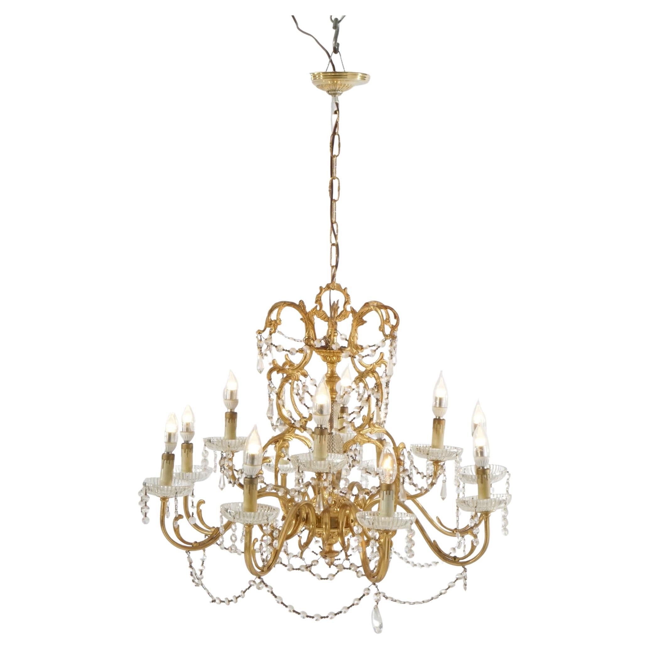 French Style Gilt & Crystal Twelve-Light Tiered Chandelier, Circa 1930 For Sale