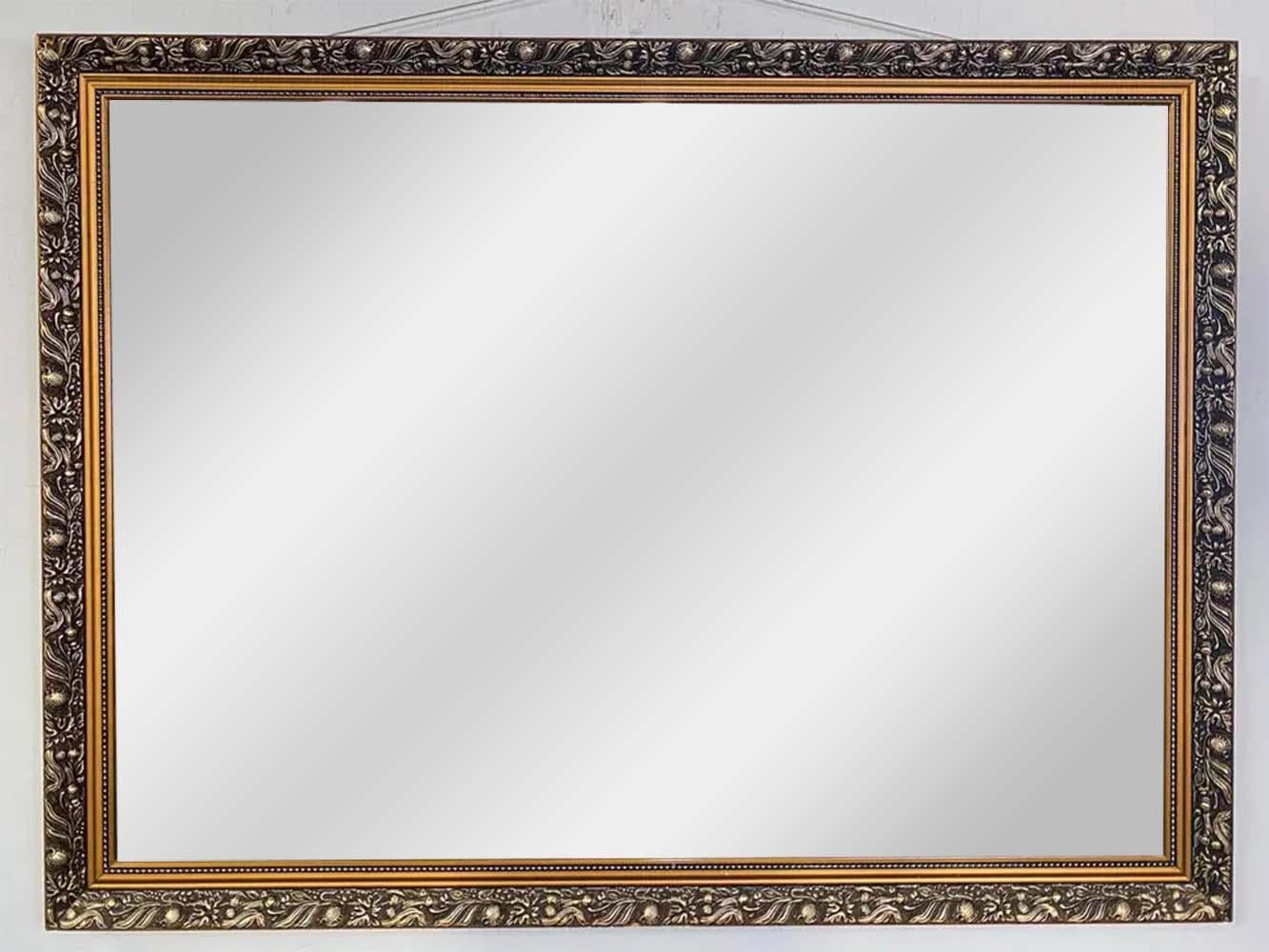 A beautiful and elegant French style mirror. In a rectangular shape, the mirror is hand carved of gilt wood and shows fine details. The mirror features a beveled glass and is sturdy. Simple and elegant, The mirror will elevate the style of any room