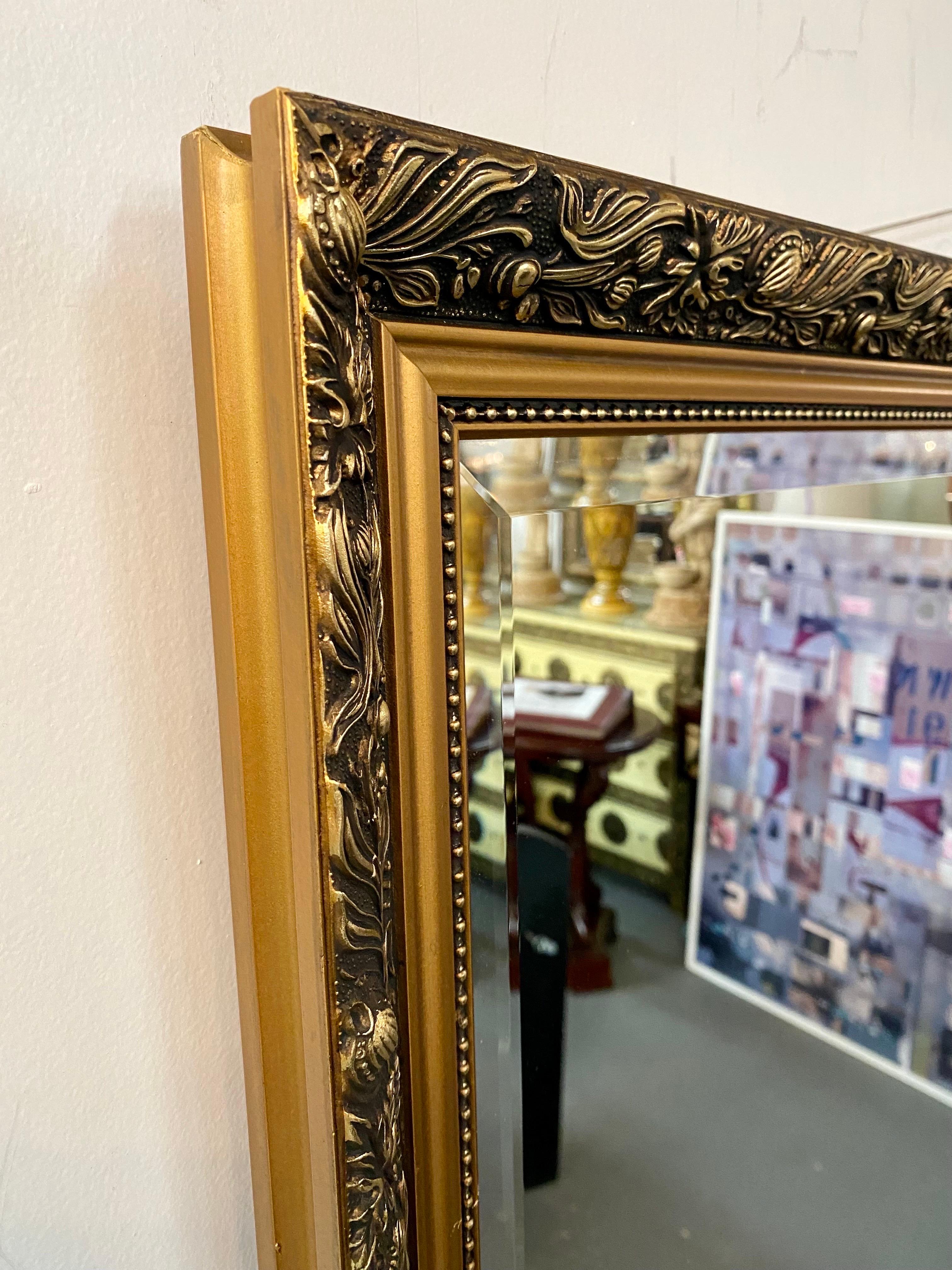 French Style Hand Carved Frame Gilt Wood Beveled Glass Mirror In Good Condition In Plainview, NY