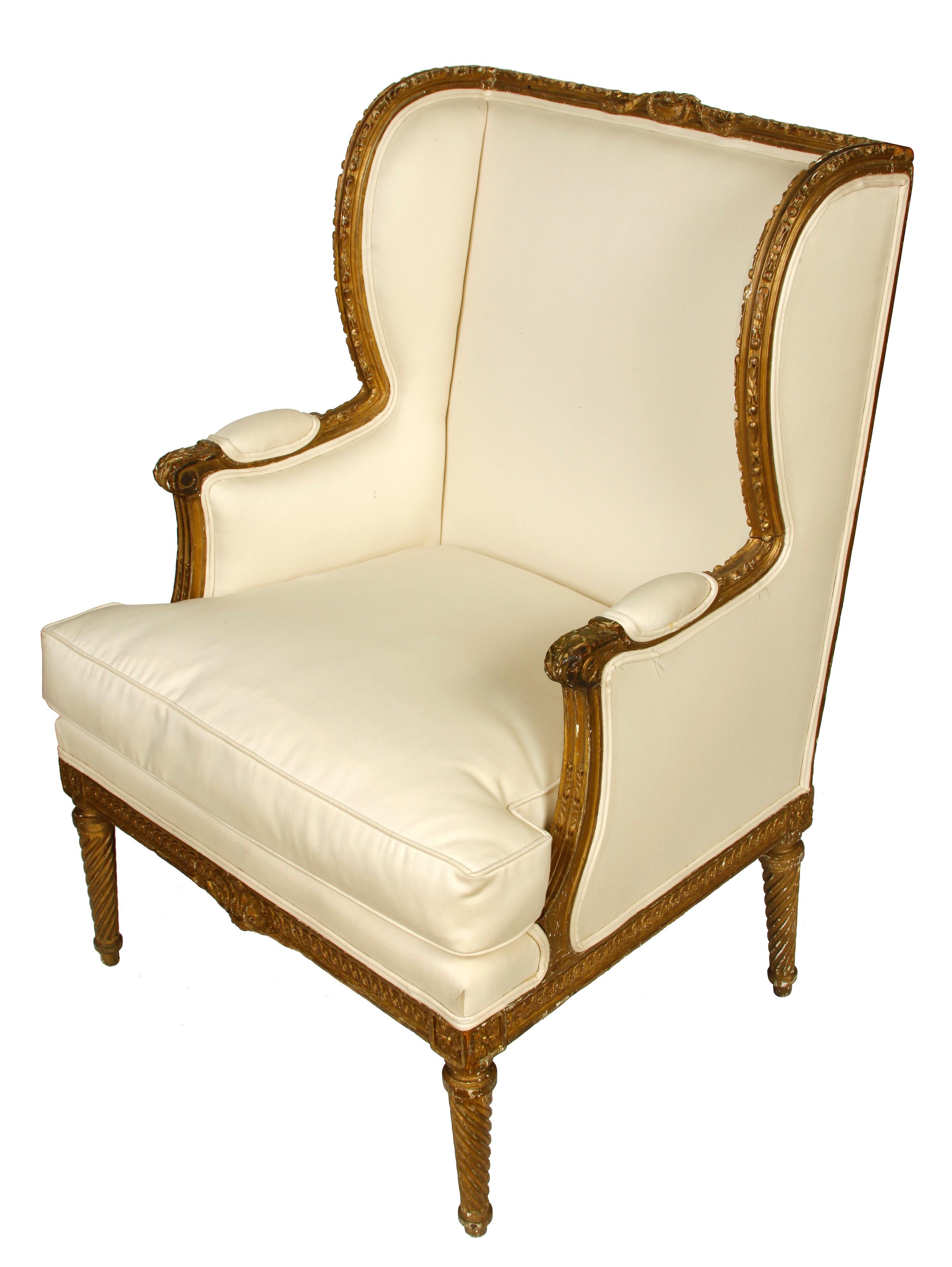 French style bergere with giltwood finish and ivory upholstery.