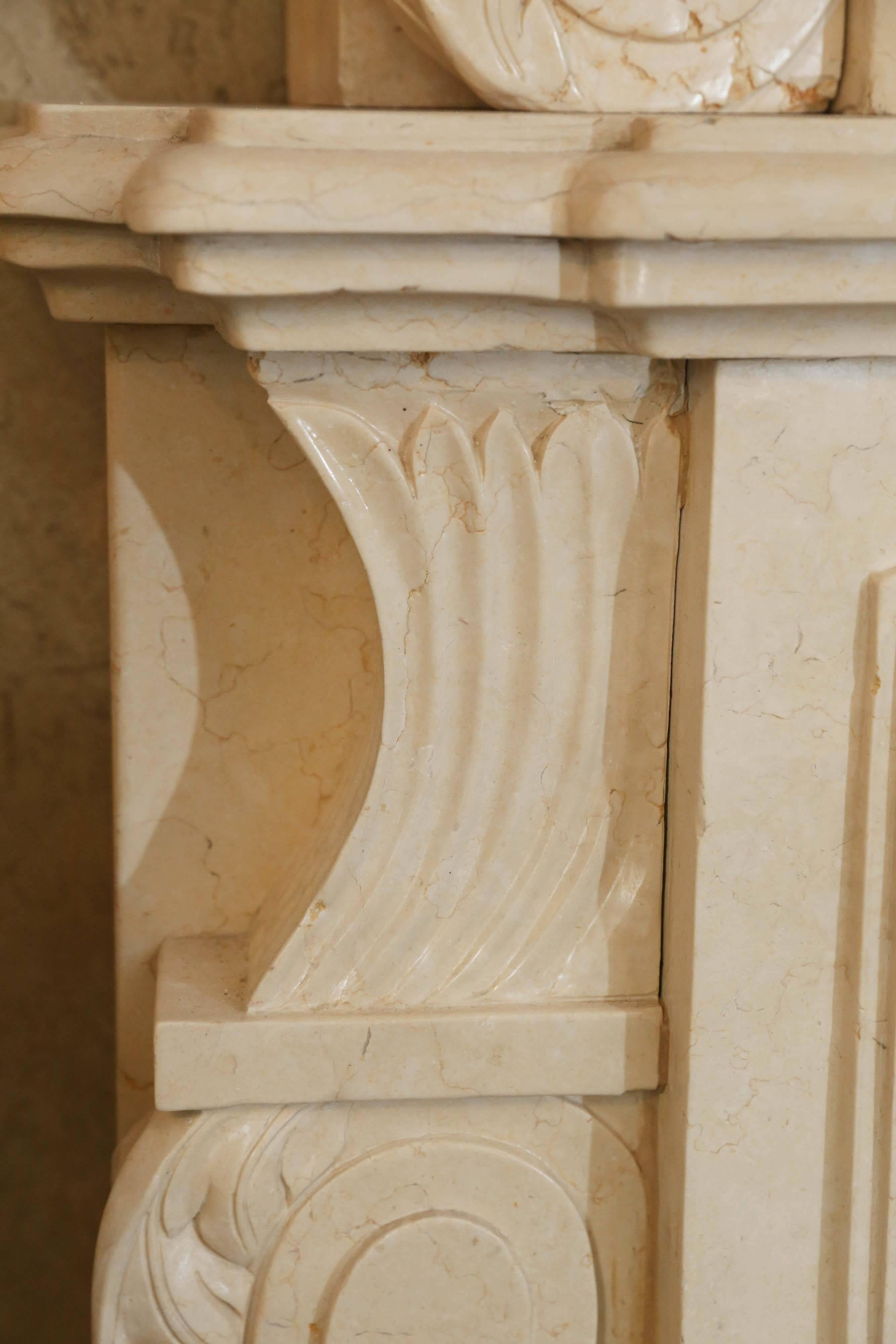 French Style Marble Hand Carved Mantel in Cream Color with Marble over Mantel In Excellent Condition For Sale In Houston, TX