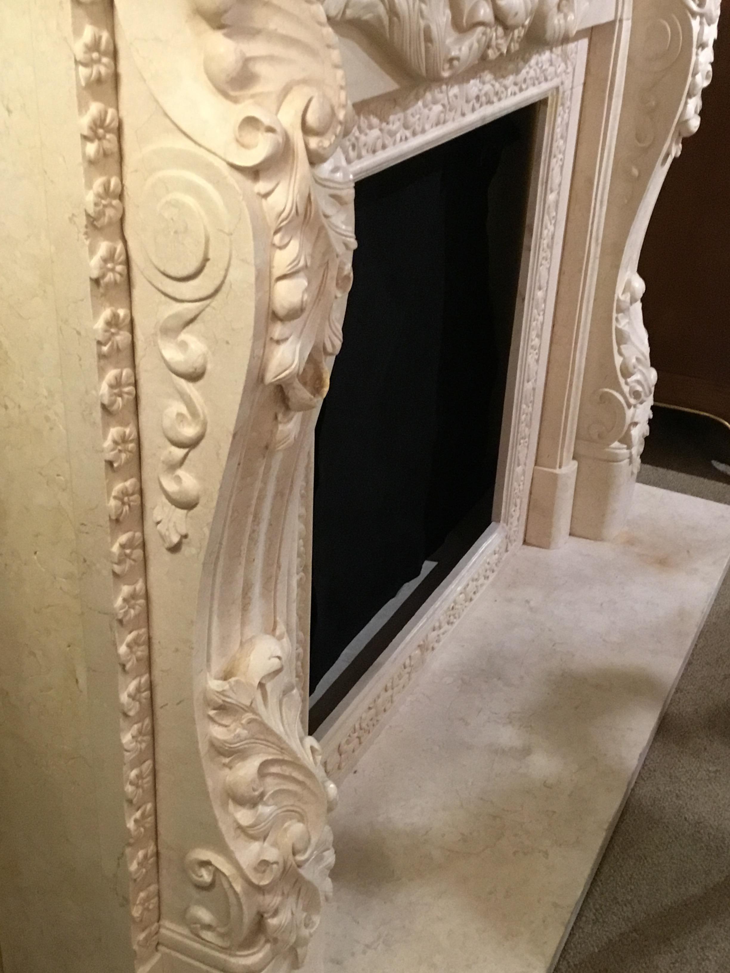 Hand-Carved French Style Marble Mantel in Cream Hue with Hand Carving For Sale