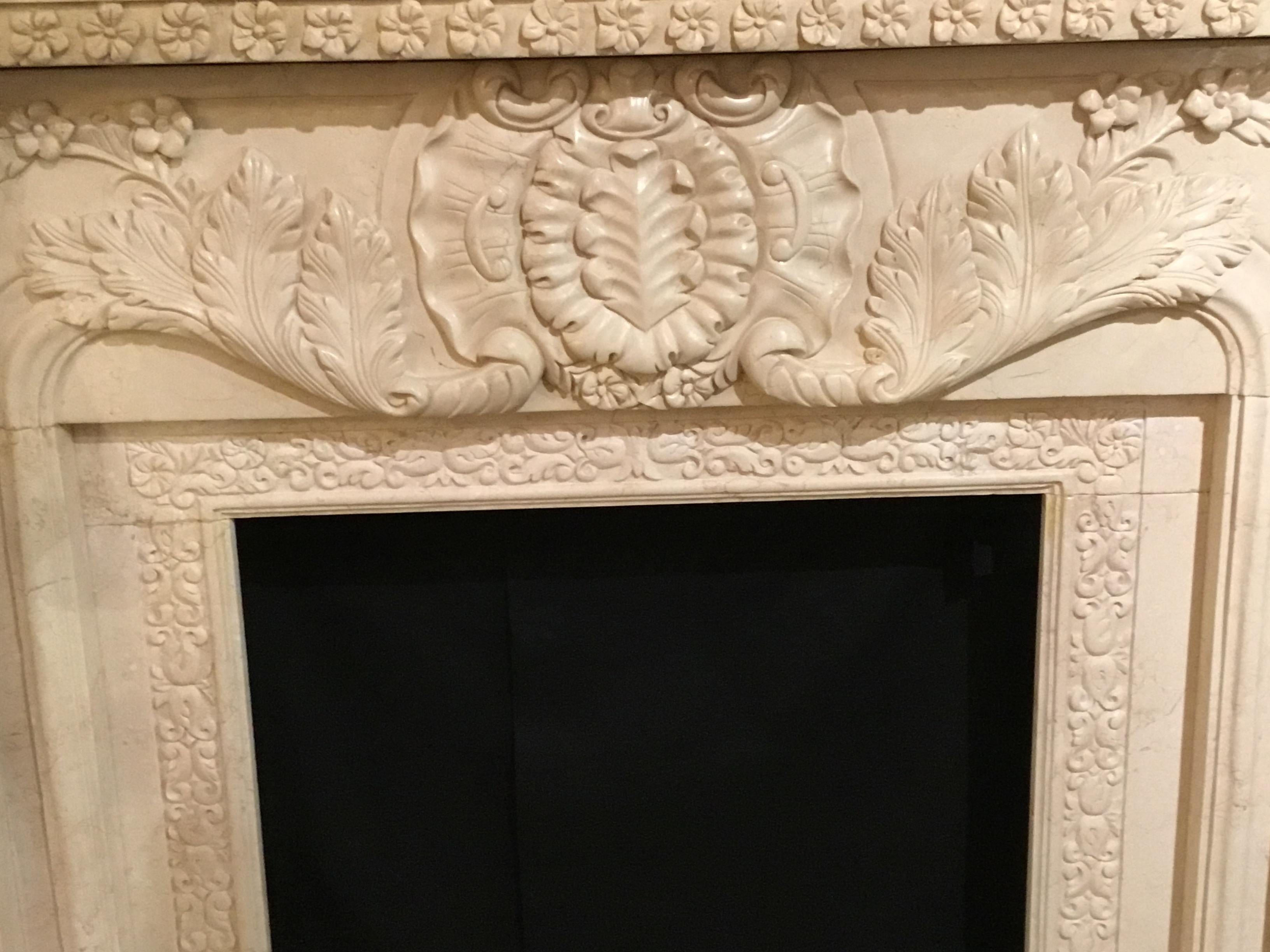 French Style Marble Mantel in Cream Hue with Hand Carving In Good Condition For Sale In Houston, TX
