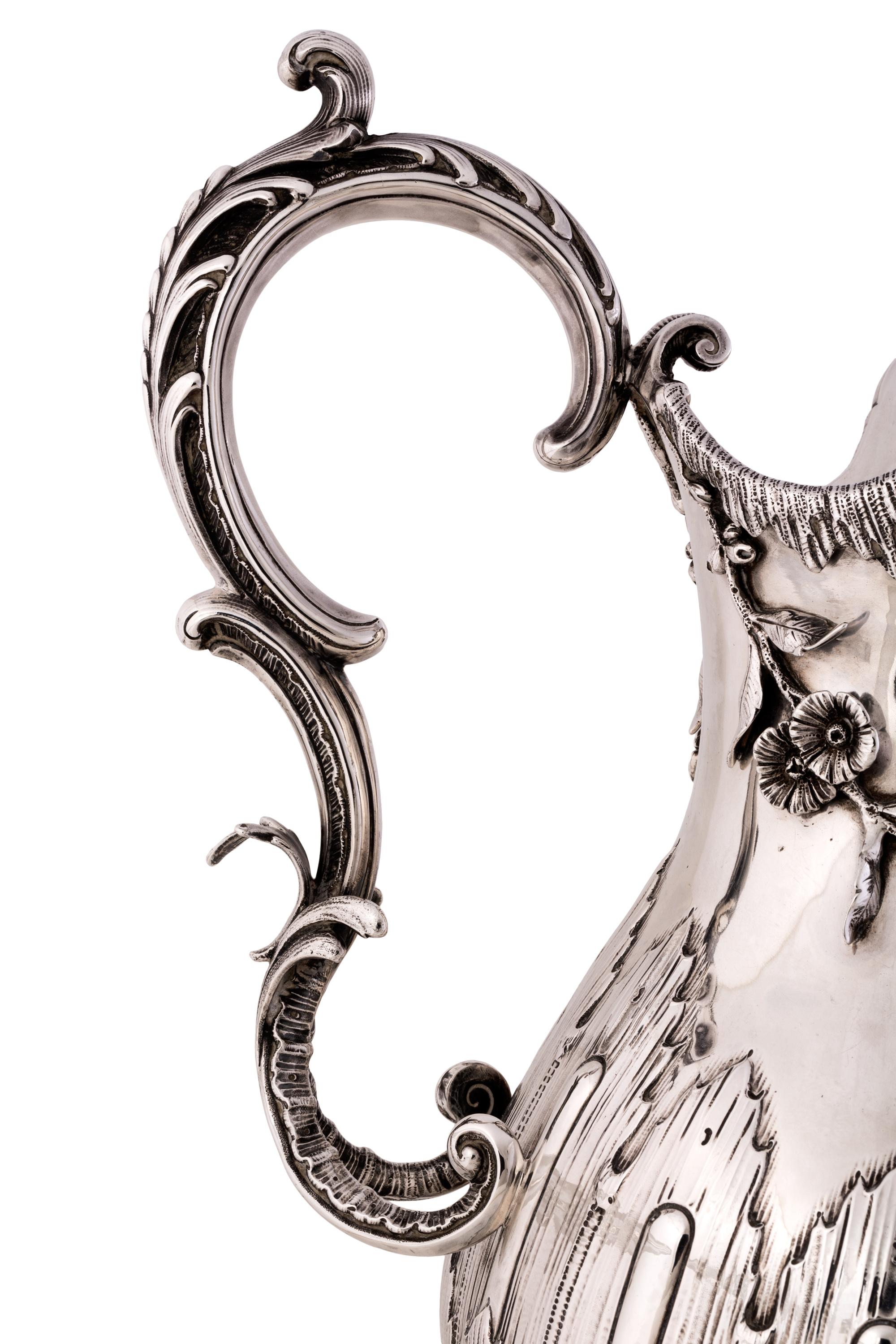 Large Silver Water Pitcher with Sculptural Floral Detailing 1