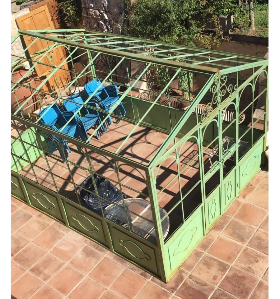 French style wrought iron greenhouse with doors and windows that open outwards in white color. Ready for glass panels to be installed.

 