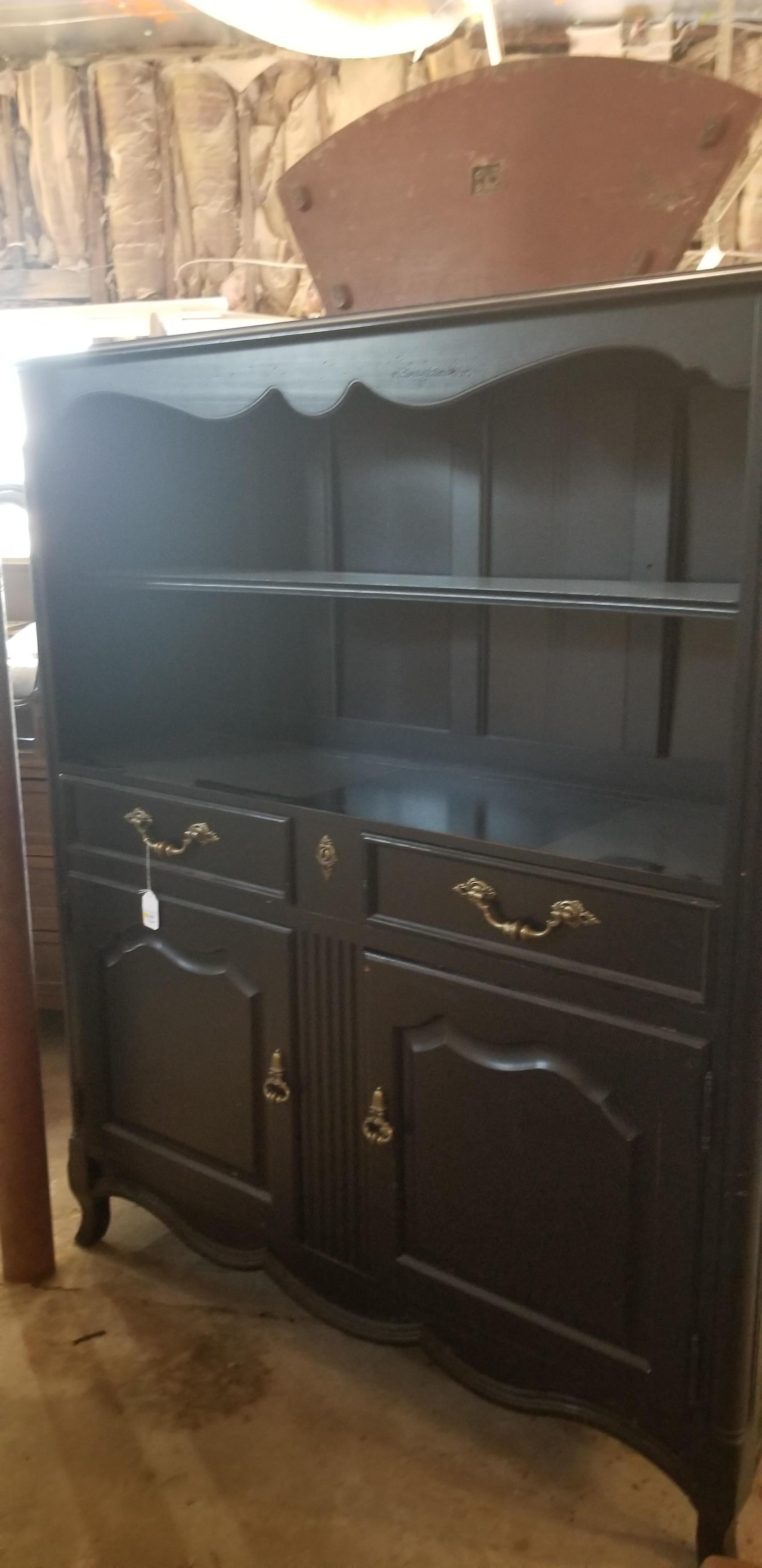 This wonderfully designed open bookcase/credenza can be used in a miriad of places. A wide hallway, a dining room, a breakfast room. It can be used in a sitting room, and a guest room. Wherever open storage and cabinet storage is needed this piece
