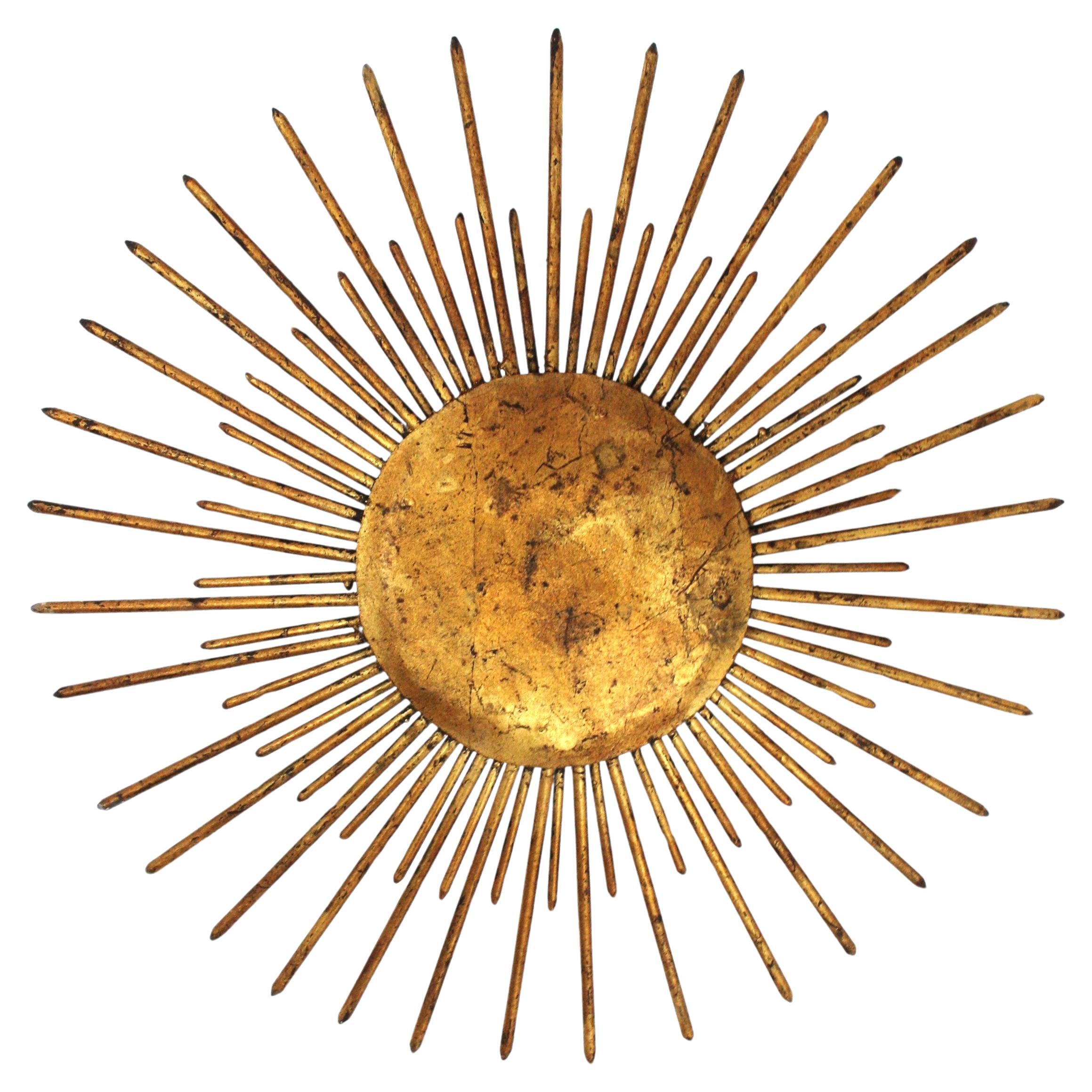 French Sunburst Ceiling Light Fixture in Gilt Wrought Iron, 1940s For Sale