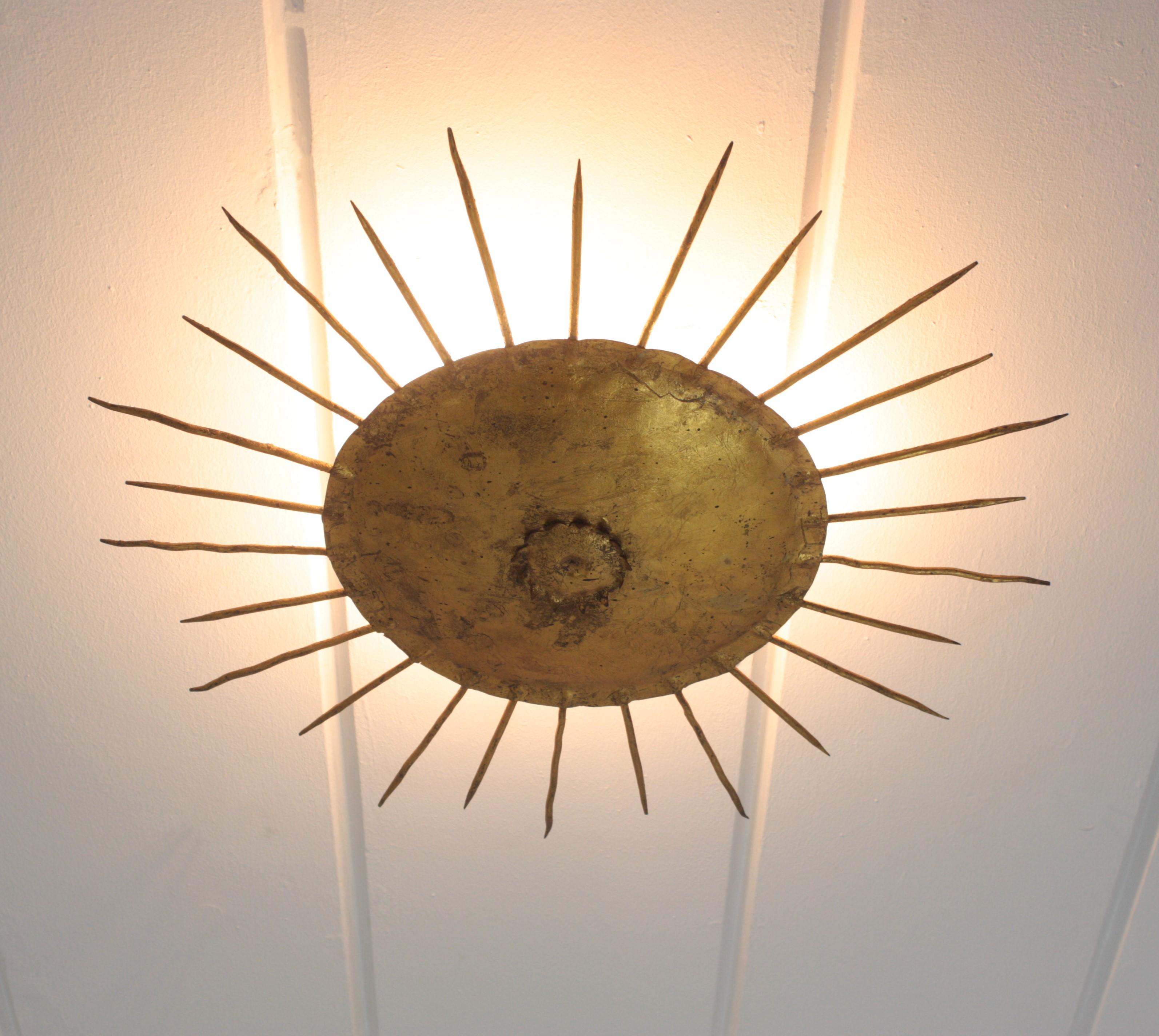 French Sunburst Ceiling Light Fixture in Gilt Wrought Iron For Sale 4