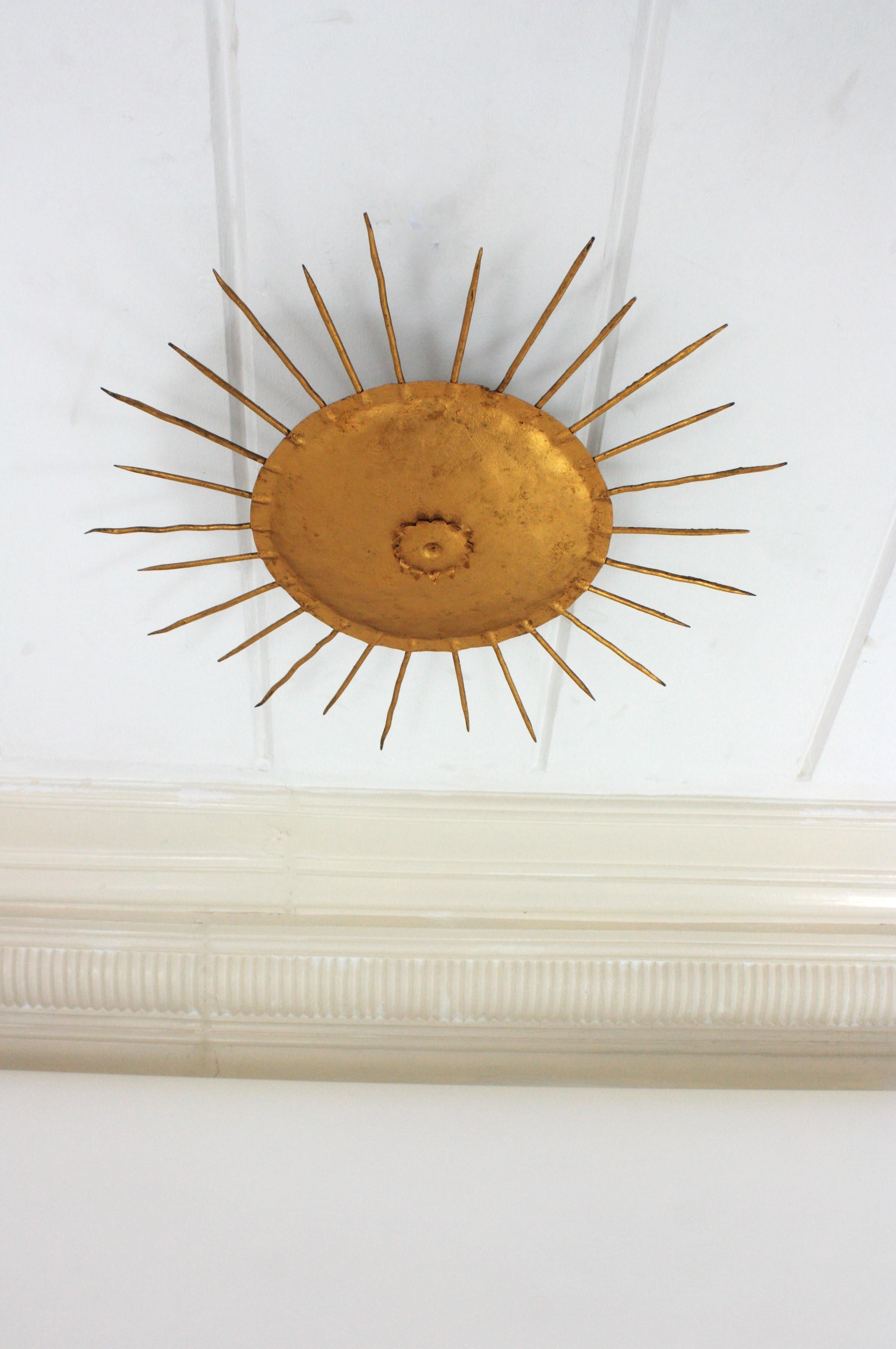 Patinated French Sunburst Ceiling Light Fixture in Gilt Wrought Iron