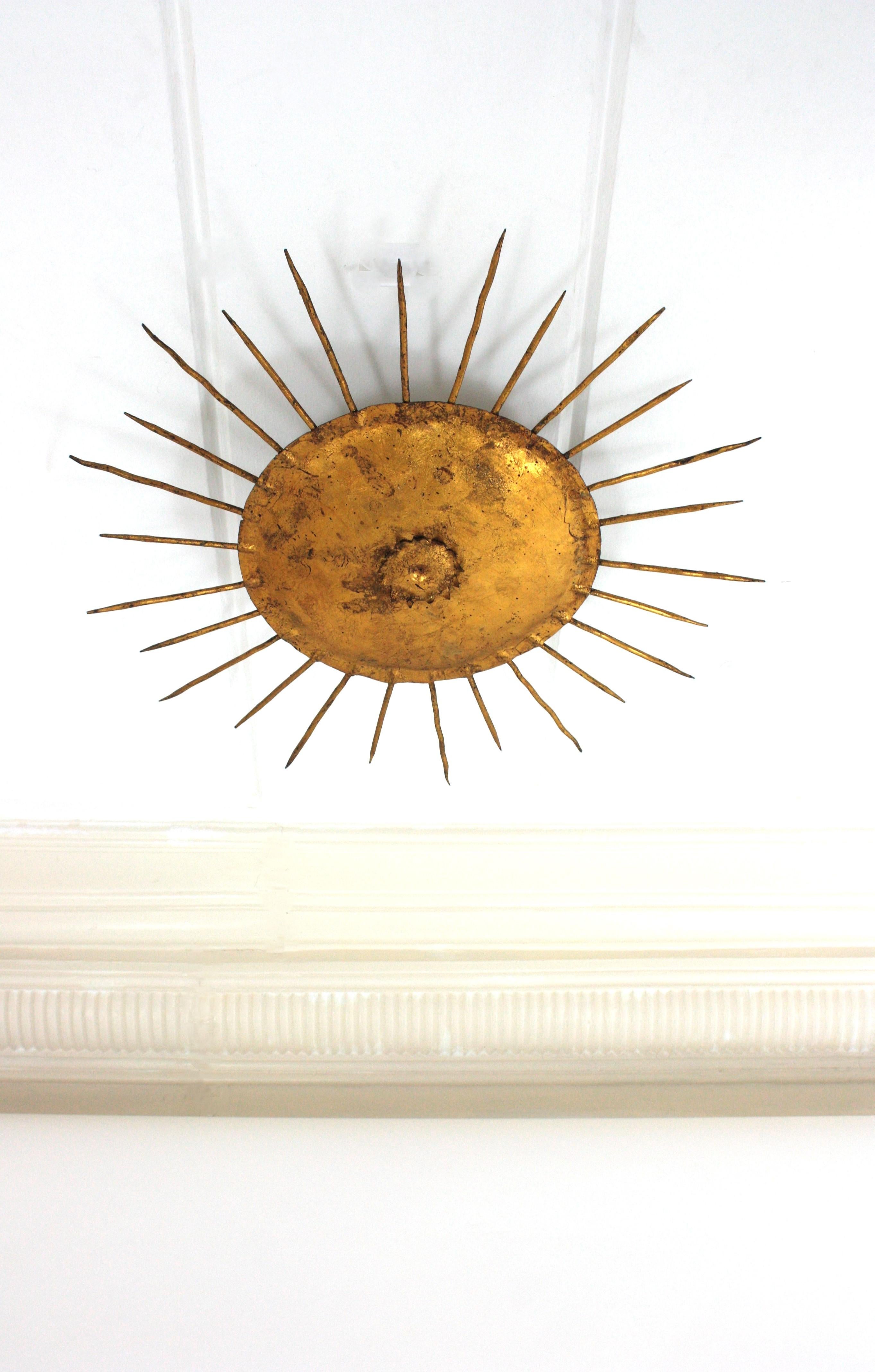 20th Century French Sunburst Ceiling Light Fixture in Gilt Wrought Iron For Sale
