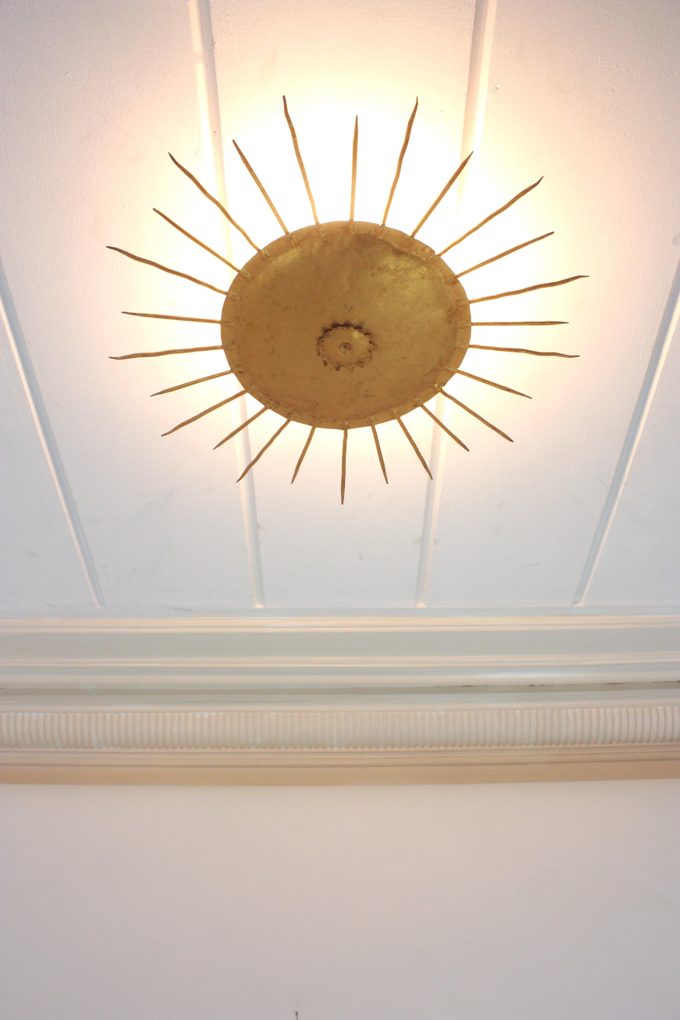 French Sunburst Ceiling Light Fixture in Gilt Wrought Iron In Good Condition In Barcelona, ES