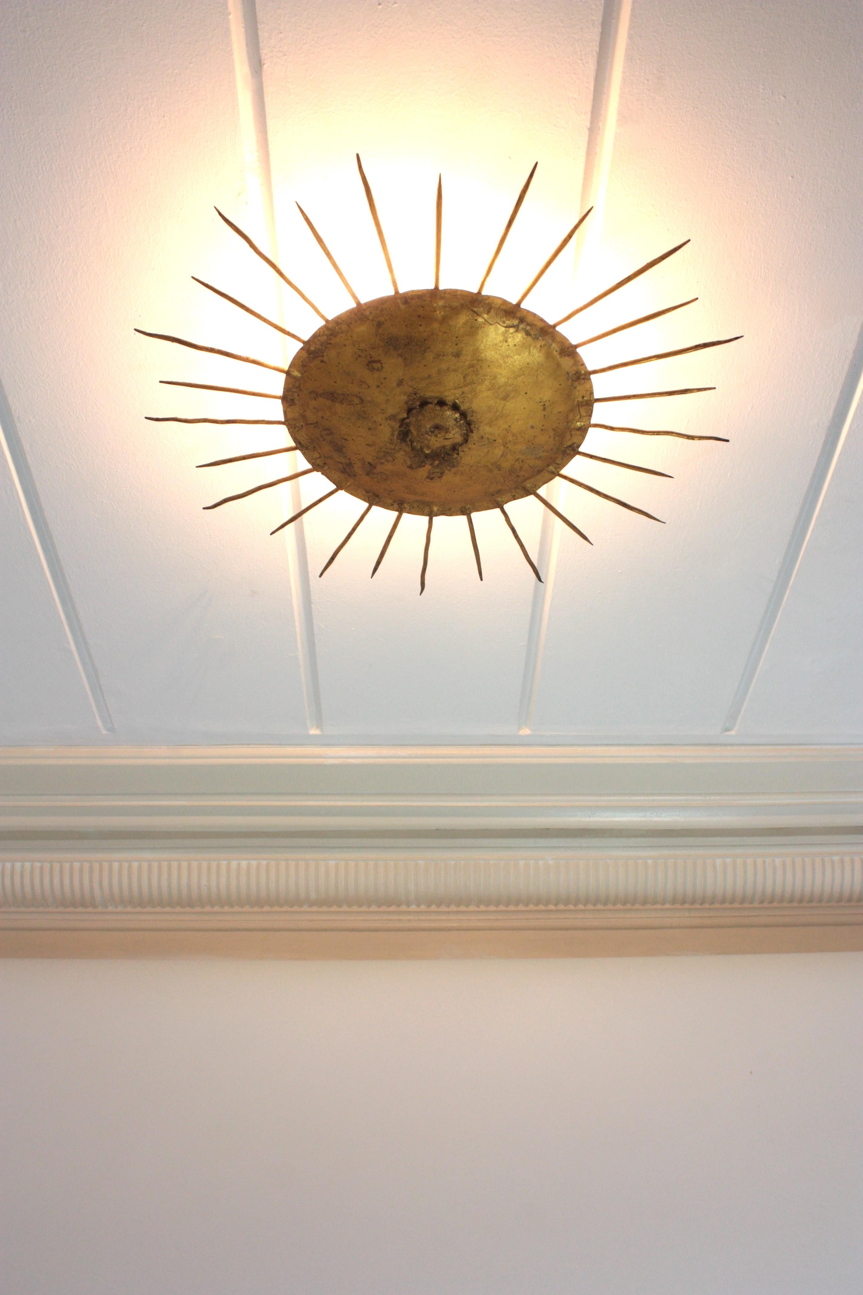 Metal French Sunburst Ceiling Light Fixture in Gilt Wrought Iron For Sale