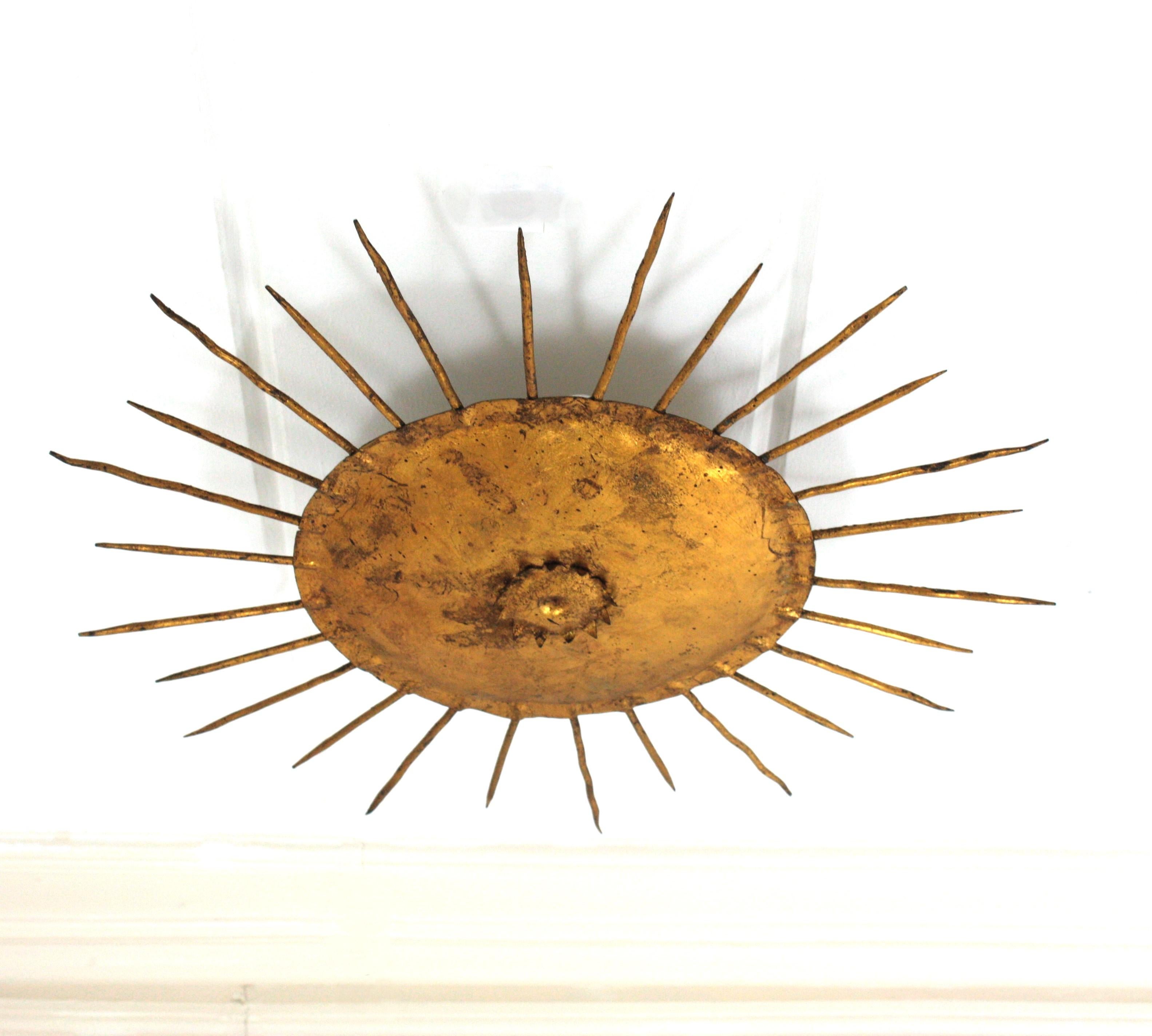 French Sunburst Ceiling Light Fixture in Gilt Wrought Iron For Sale 3