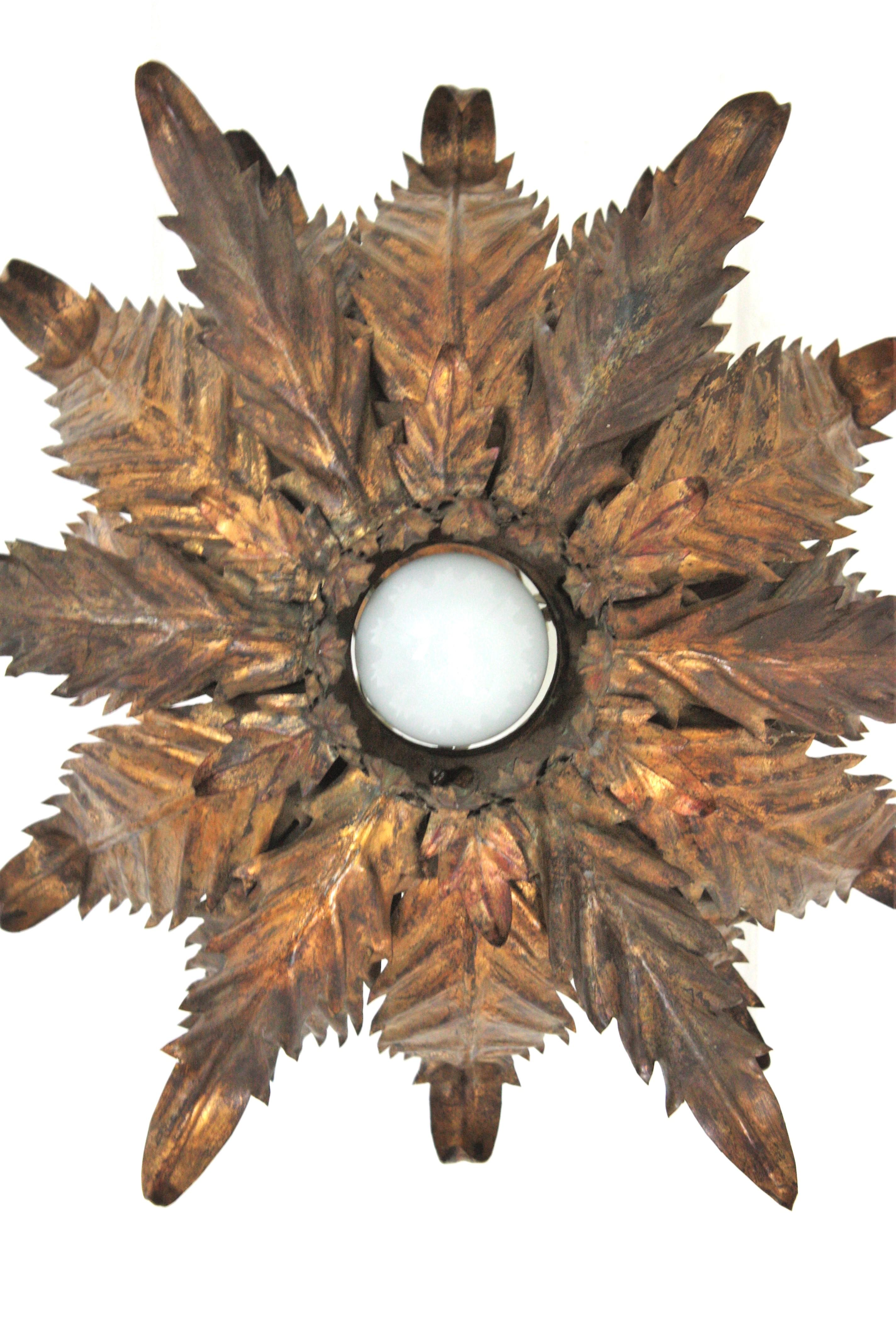 French Sunburst Foliage Ceiling Light Fixture / Chandelier in Gilt Iron, 1940s For Sale 4