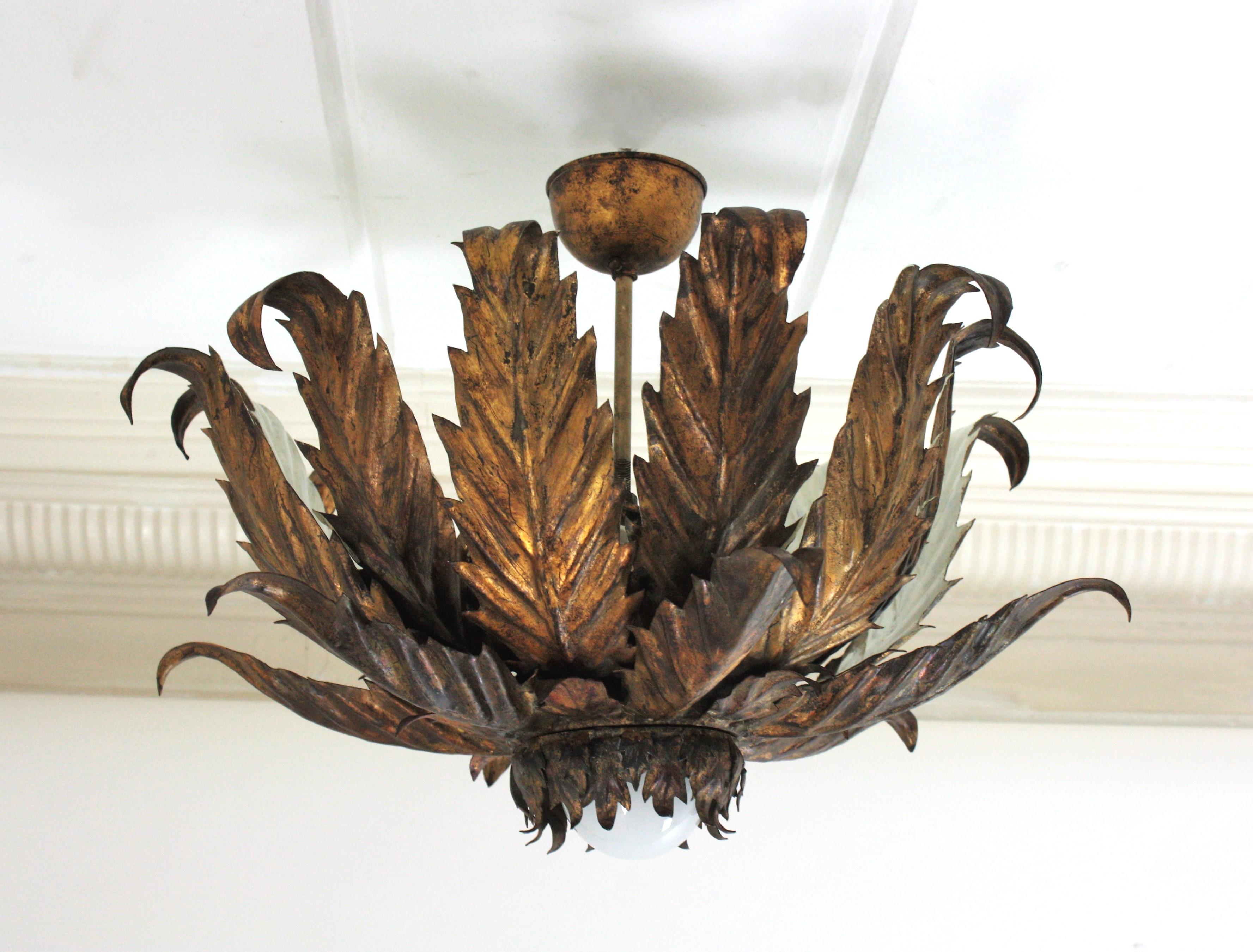 20th Century French Sunburst Foliage Ceiling Light Fixture / Chandelier in Gilt Iron, 1940s For Sale
