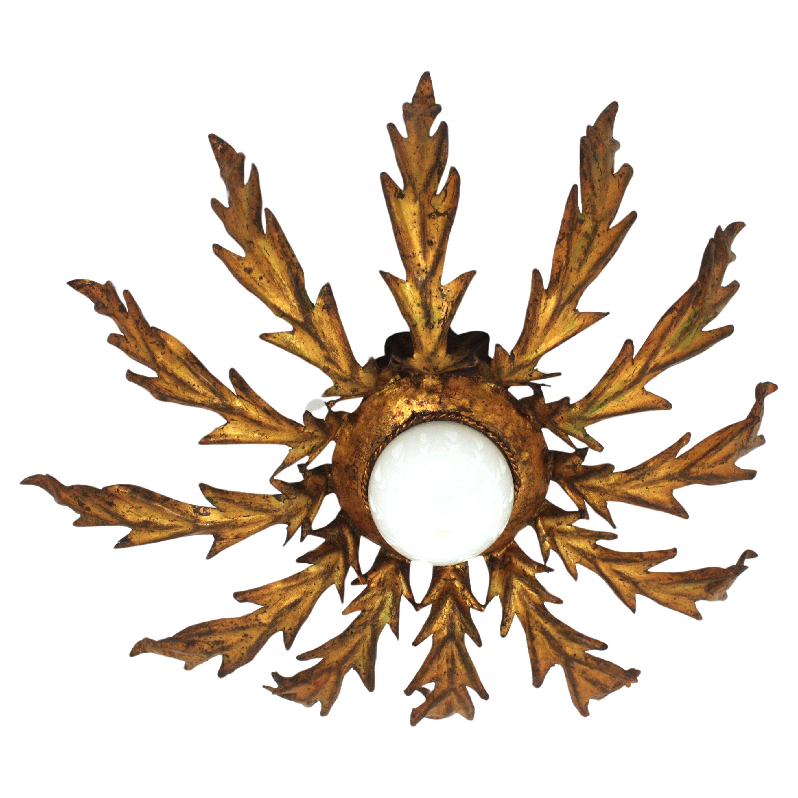 French Sunburst Leafed Ceiling Light Fixture in Gilt Iron, 1940s For Sale