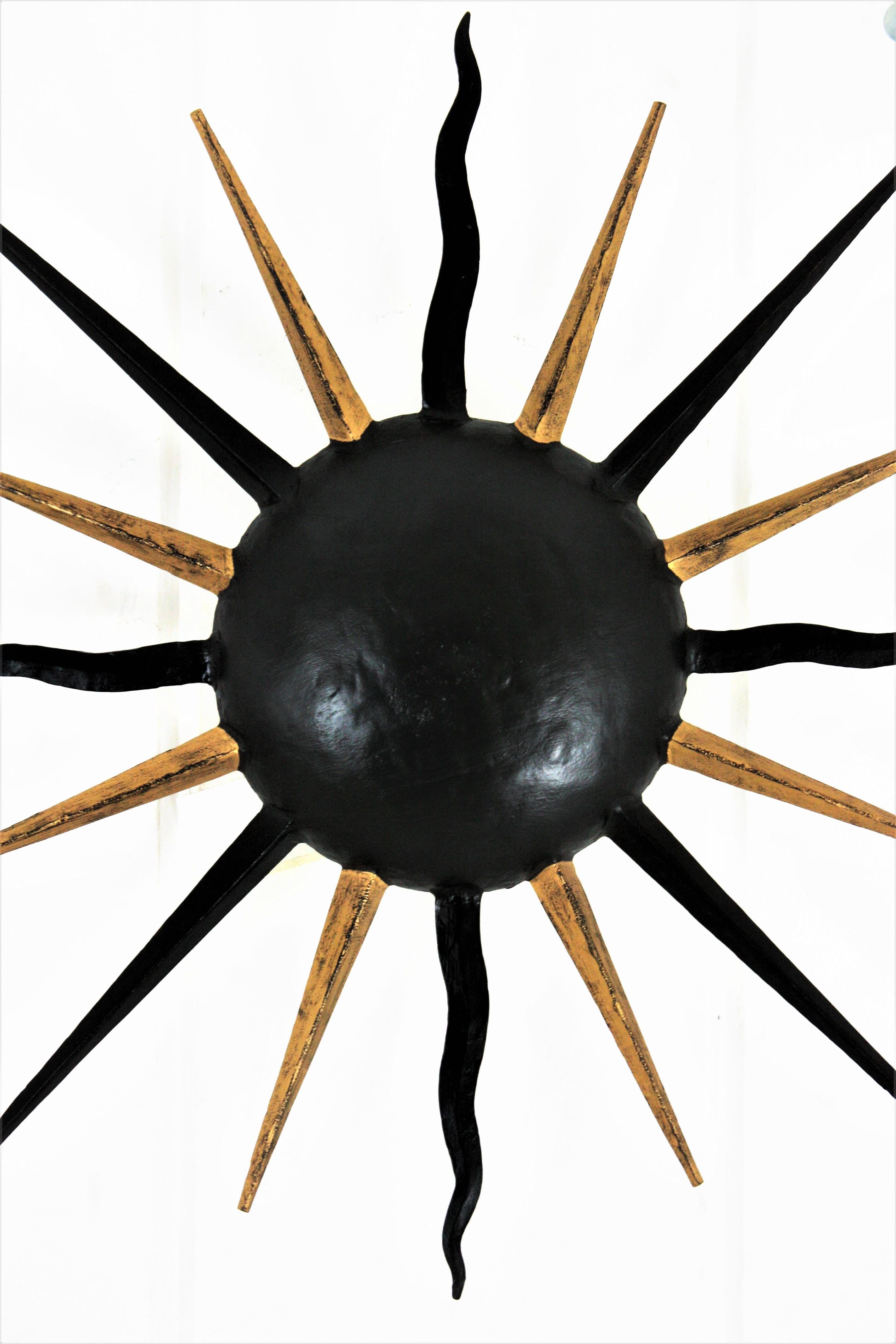 French Sunburst Light Fixture in Black and Gilt Iron, Gilbert Poillerat Style For Sale 7