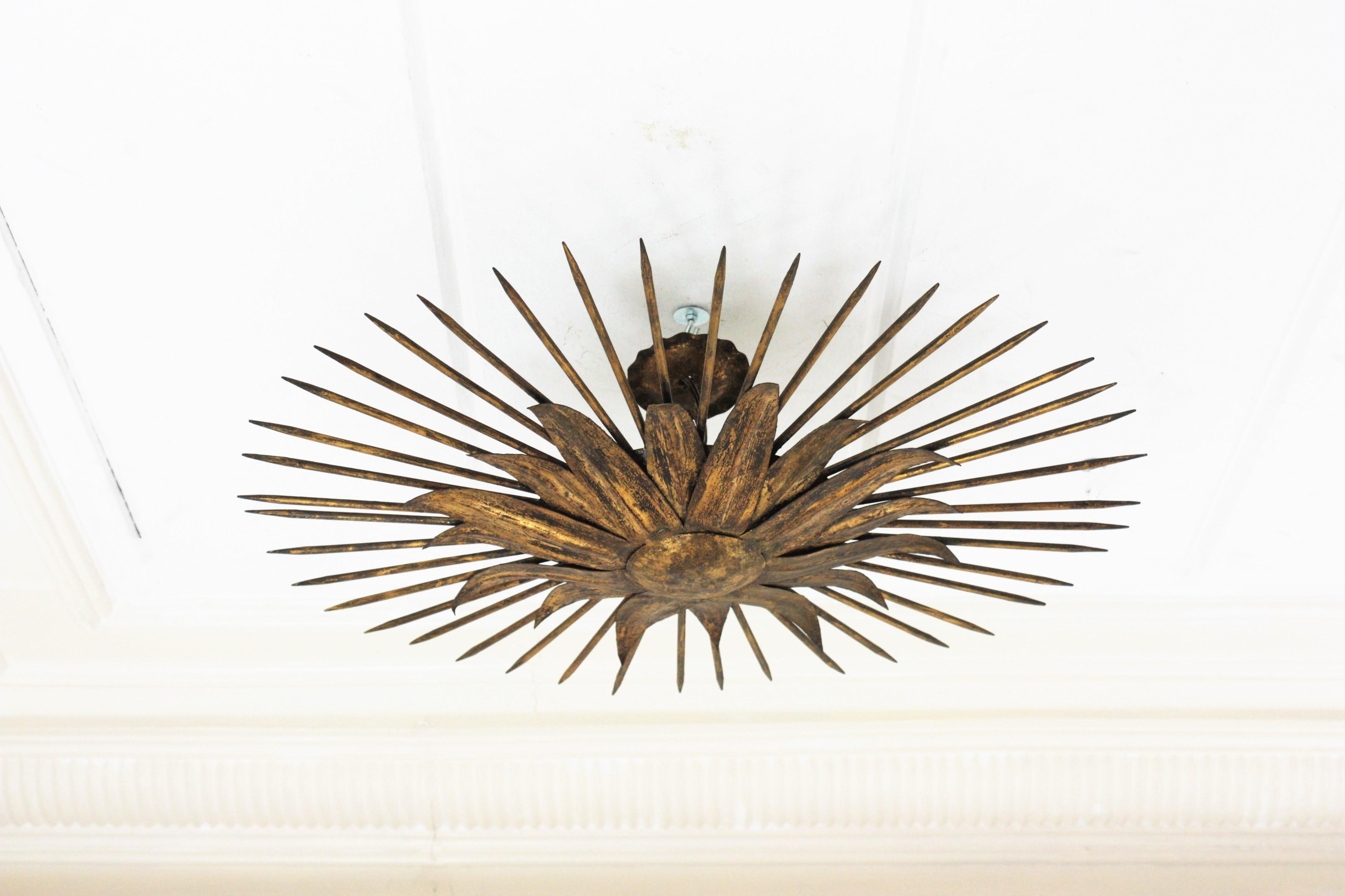 French Sunburst Light Fixture in Gilt Iron with Nail Detail, 1940s For Sale 7
