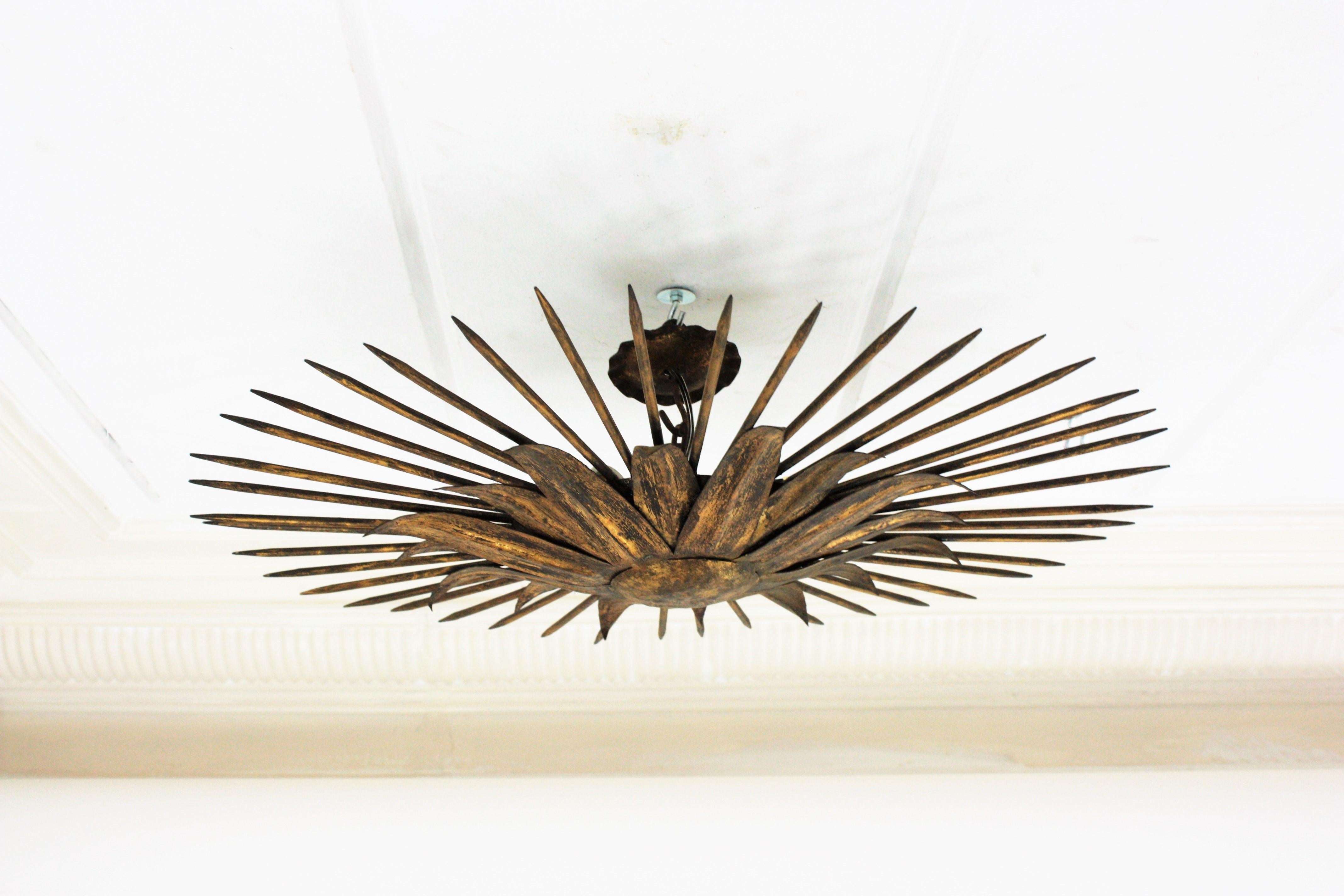 French Sunburst Light Fixture in Gilt Iron with Nail Detail, 1940s For Sale 8
